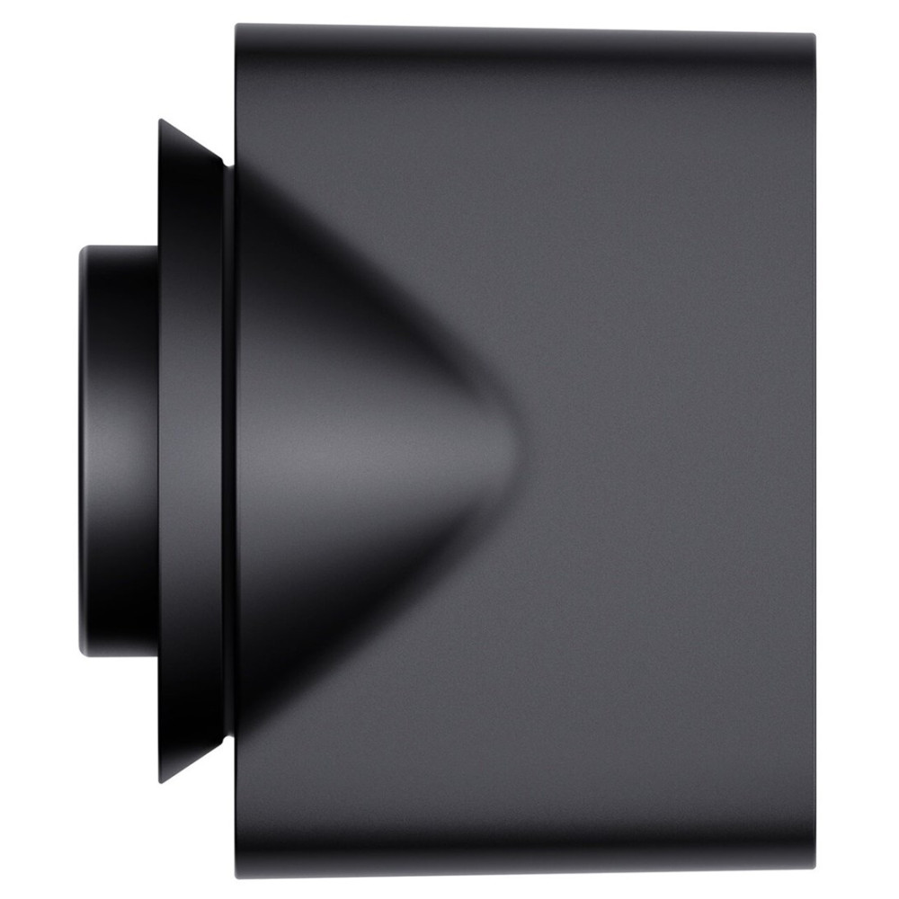 Zbliżenie czarnego, przemysłowego urządzenia. Z lewej strony część cylindryczna, z prawej kwadratowy korpus.