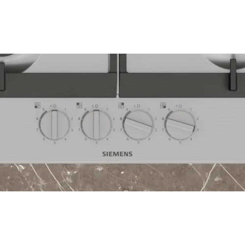 Primer plano de una encimera Siemens con cuatro mandos. Los mandos son plateados con números del 1 al 9. El fondo es gris.