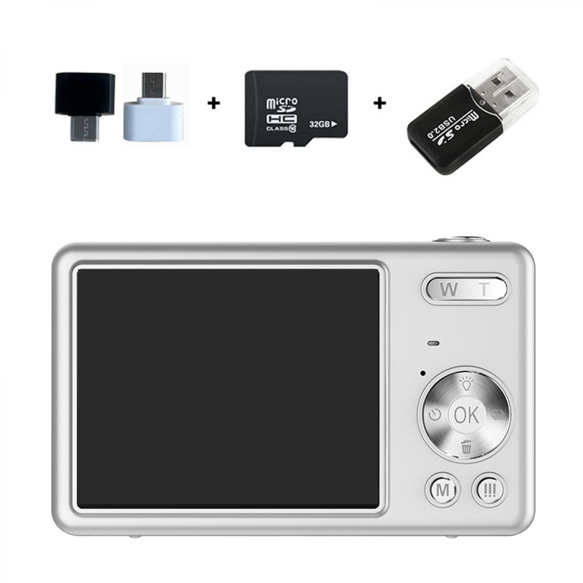 Eine Digitalkamera mit schwarzem Bildschirm, SD-Karten und USB-Adaptern vor weißem Hintergrund.
