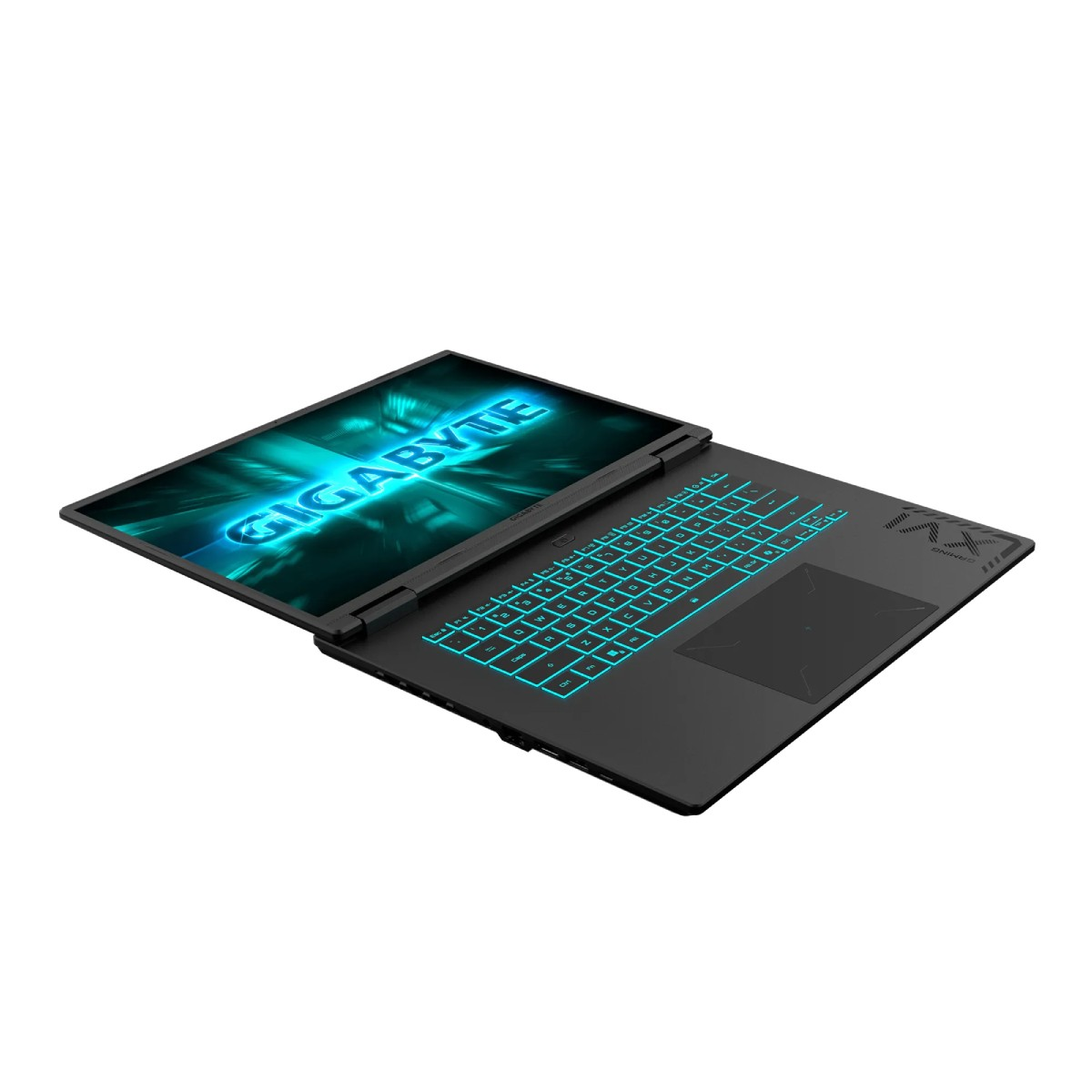 Portátil negro abierto, con teclado azul brillante. La pantalla muestra 'GIGABYTE' en azul. Portátil sobre una superficie blanca.