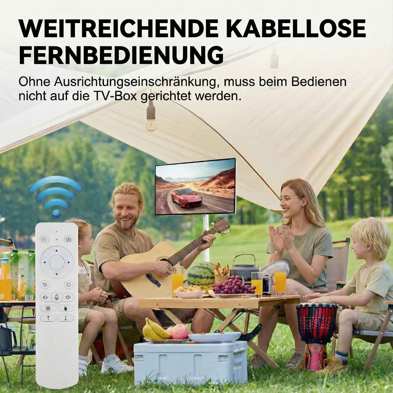 Familie beim Picknick, mit Fernbedienung im Vordergrund. Sie schauen fern. Mit Gitarre, Früchten und einer Trommel.