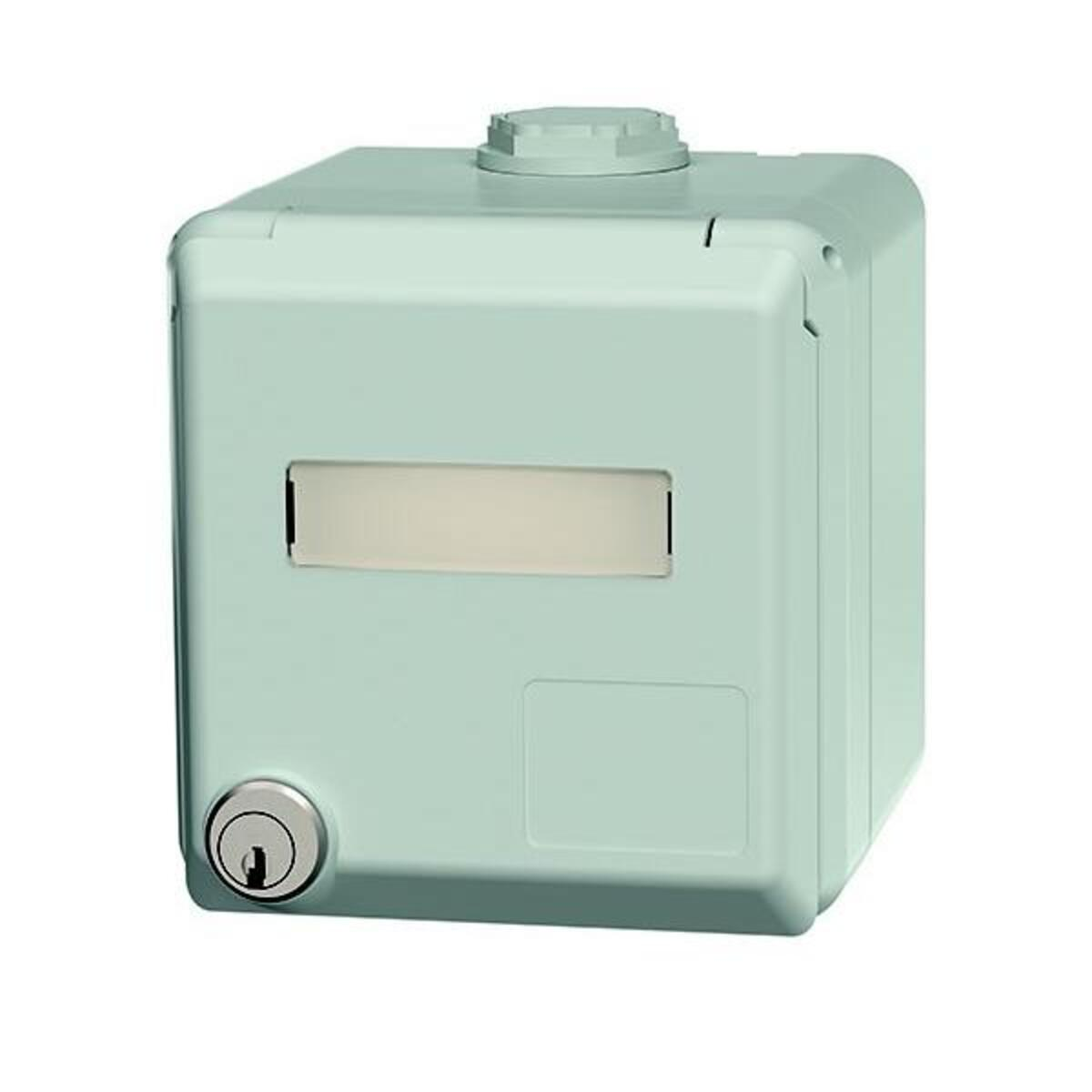 Una cassetta delle lettere quadrata verde menta con una serratura, una fessura e una piccola parte superiore rotonda. È una scatola con bordi arrotondati.