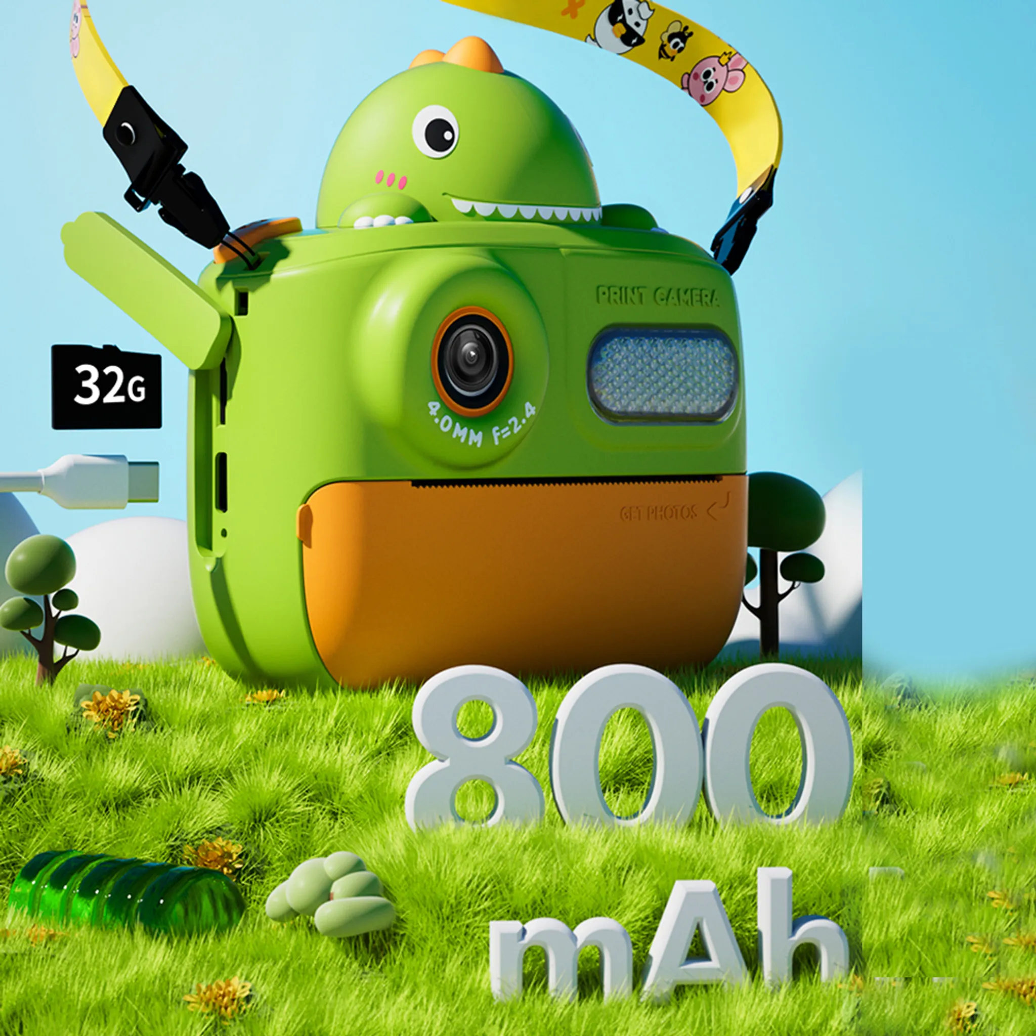 Grüne Dinosaurierkamera auf Gras. Enthält 32G, 800 mAh und einen Cartoon-Gurt. Der Hintergrund ist blau.