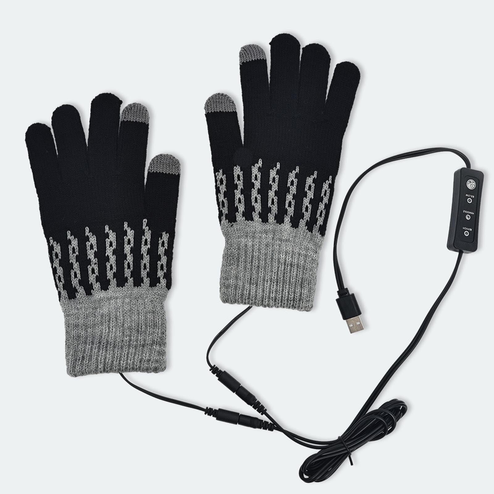 Schwarze Handschuhe mit grauen Bündchen und Spitzen, verbunden durch Drähte. USB-Stecker und Bedienfeld sichtbar.