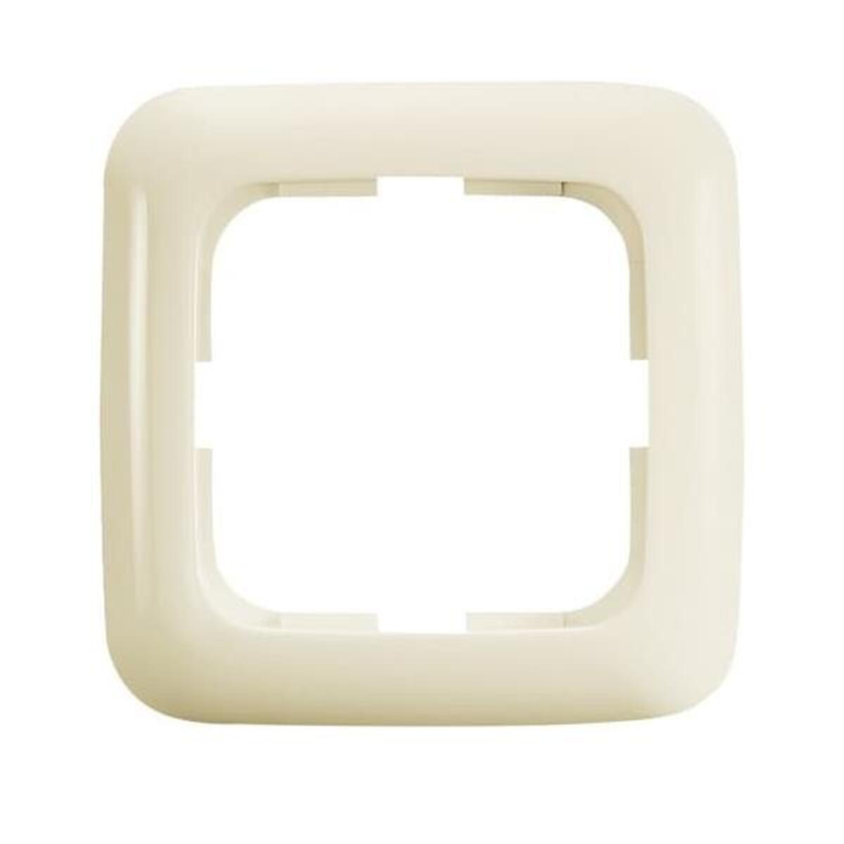 Una copertura per presa elettrica quadrata, color crema. Ha angoli arrotondati e un'apertura quadrata al centro.