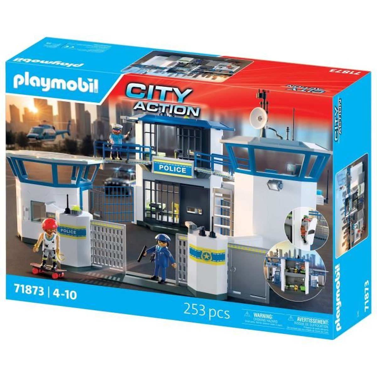 Set de estación de policía Playmobil City Action. Incluye figuras, edificios, helicóptero y accesorios. Predominan los colores azul, blanco y gris.