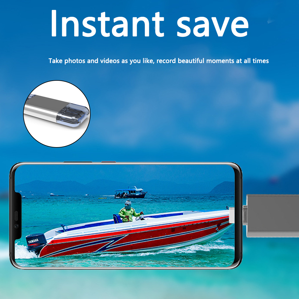 Ein Handy zeigt ein Boot auf dem Meer. Ein USB-Stick ist angeschlossen. Text: 'Sofort speichern' und 'Fotos und Videos aufnehmen'.