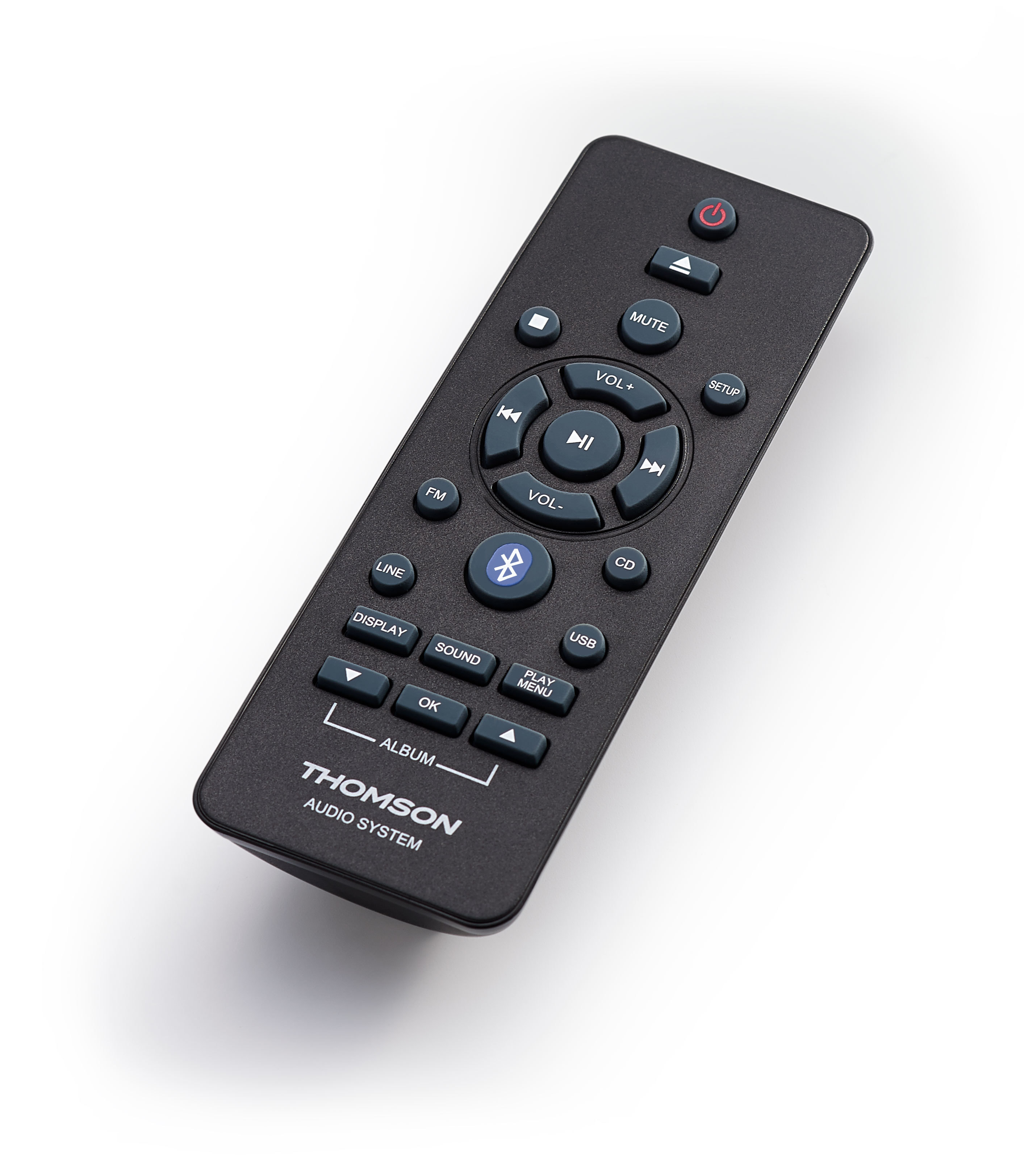 Czarny pilot do systemu audio Thomson z wieloma przyciskami, w tym głośnością, wyciszeniem i Bluetooth.