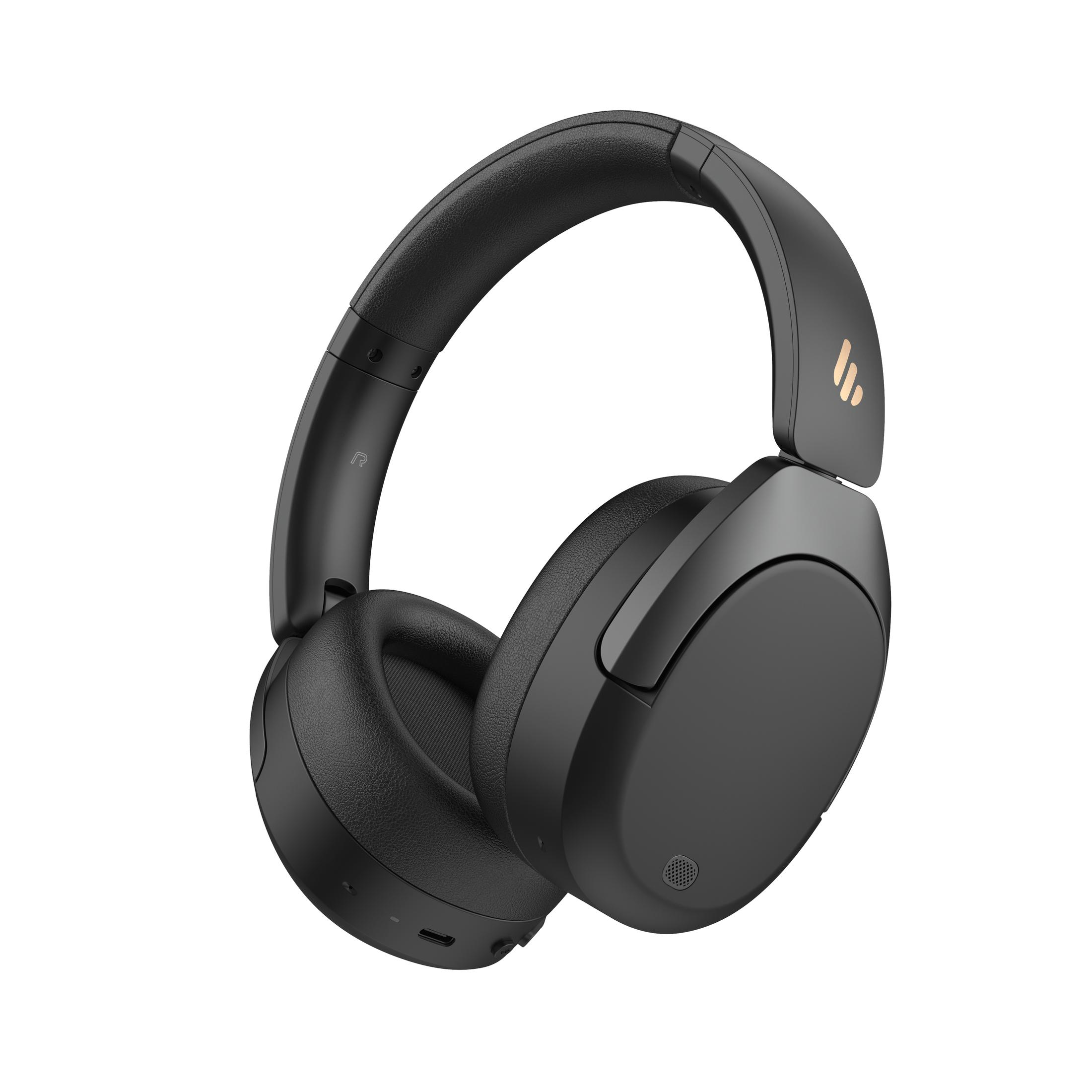 Cuffie over-ear nere. I padiglioni e l'archetto sono neri. Il logo è oro. Lo sfondo è bianco.