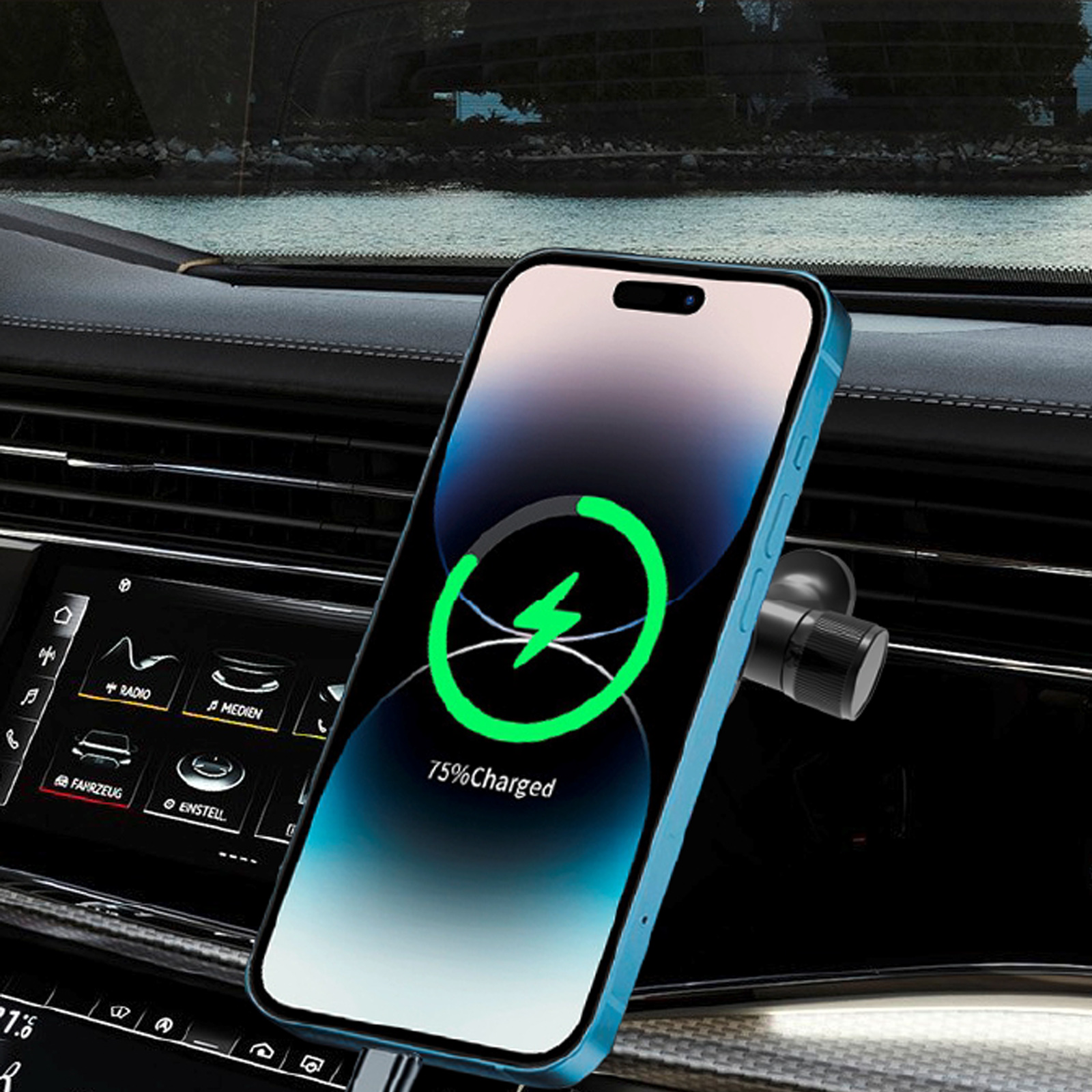 Un teléfono cargando en un coche. El teléfono muestra un símbolo de carga al 75%. El teléfono está montado en una ventilación del coche.