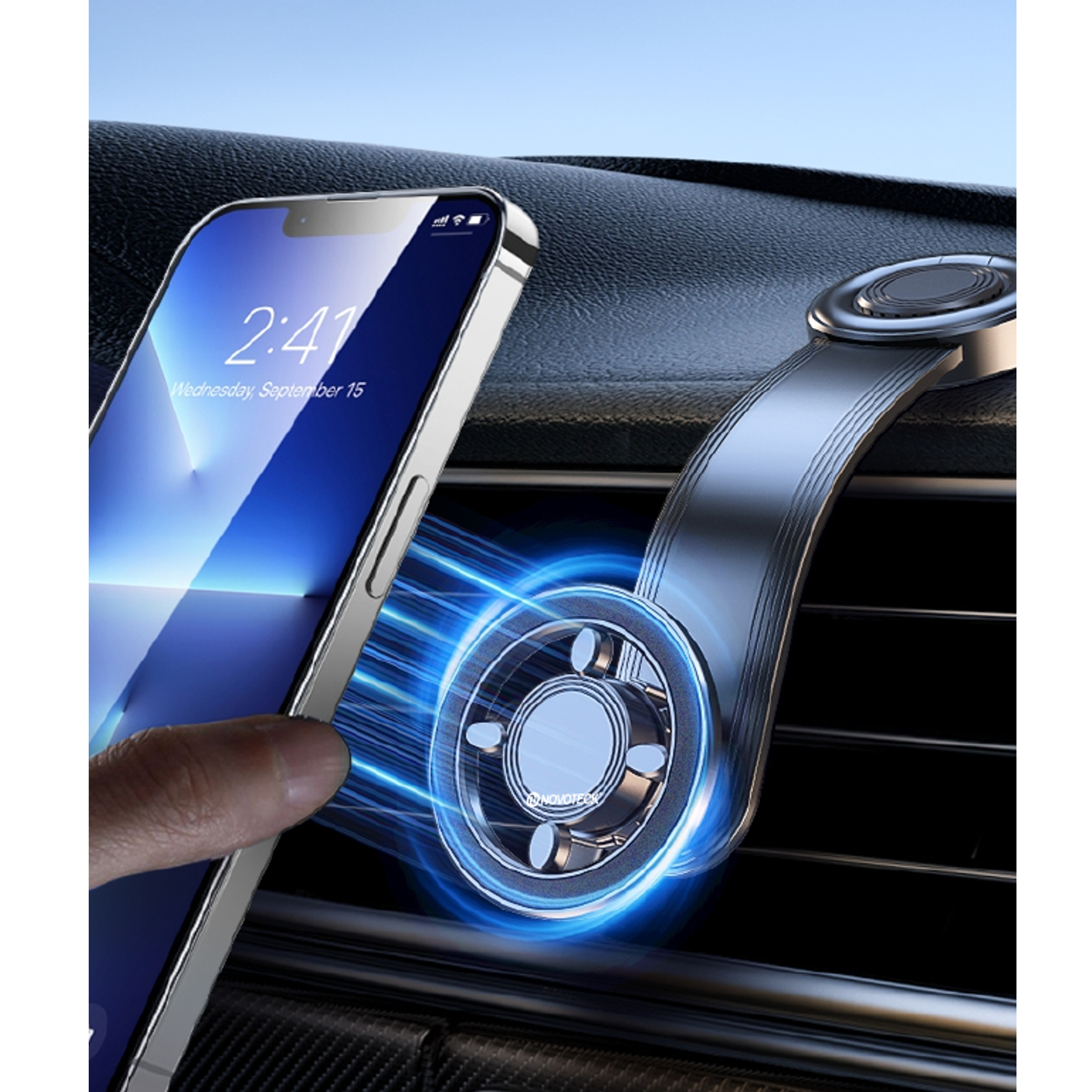 Un teléfono fijado a un soporte para ventilación de coche. La pantalla muestra la fecha y hora. Luz azul rodea el soporte.