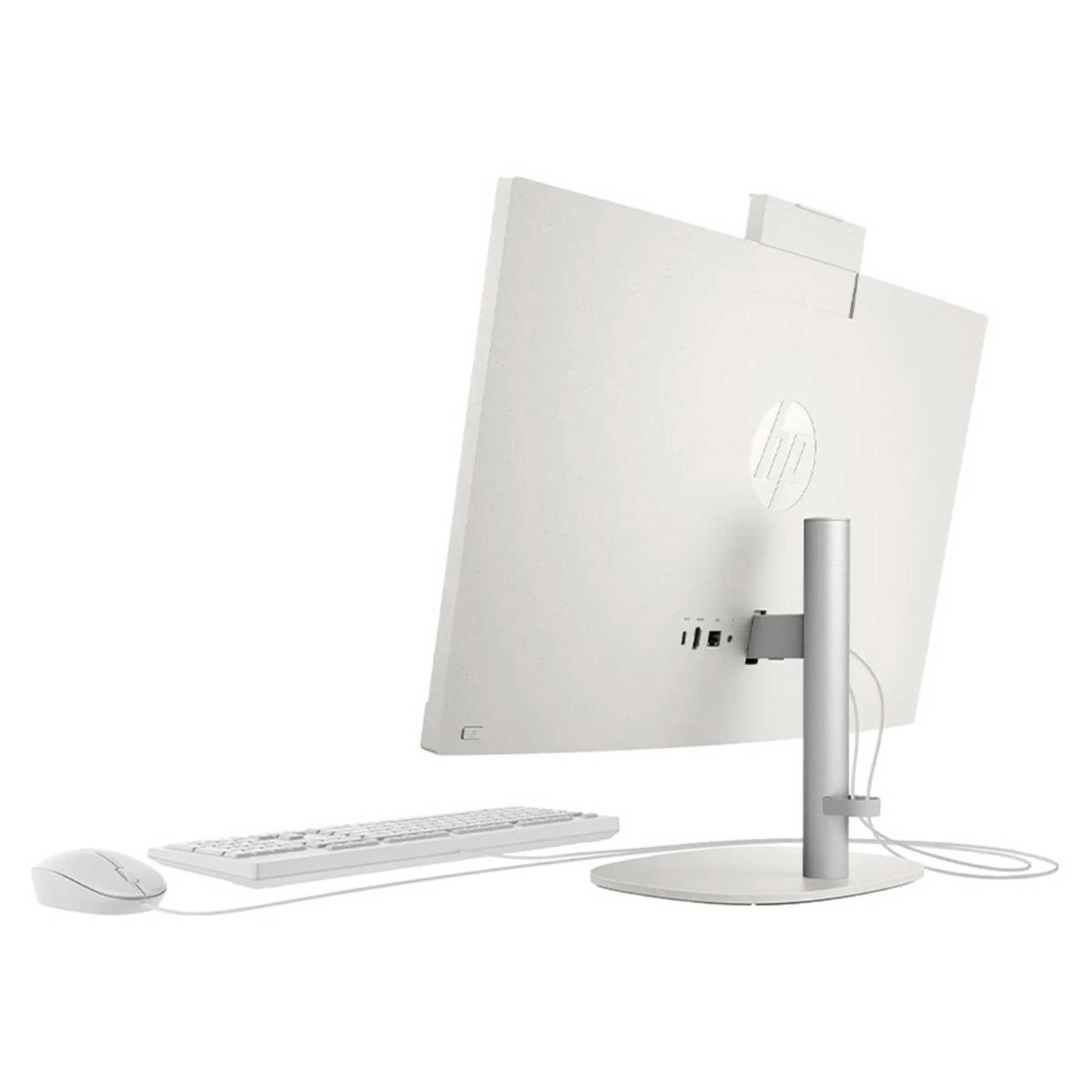 Beyaz HP hepsi bir arada bilgisayar. Monitör, klavye ve fare içerir. Monitör bir stand tarafından desteklenir.