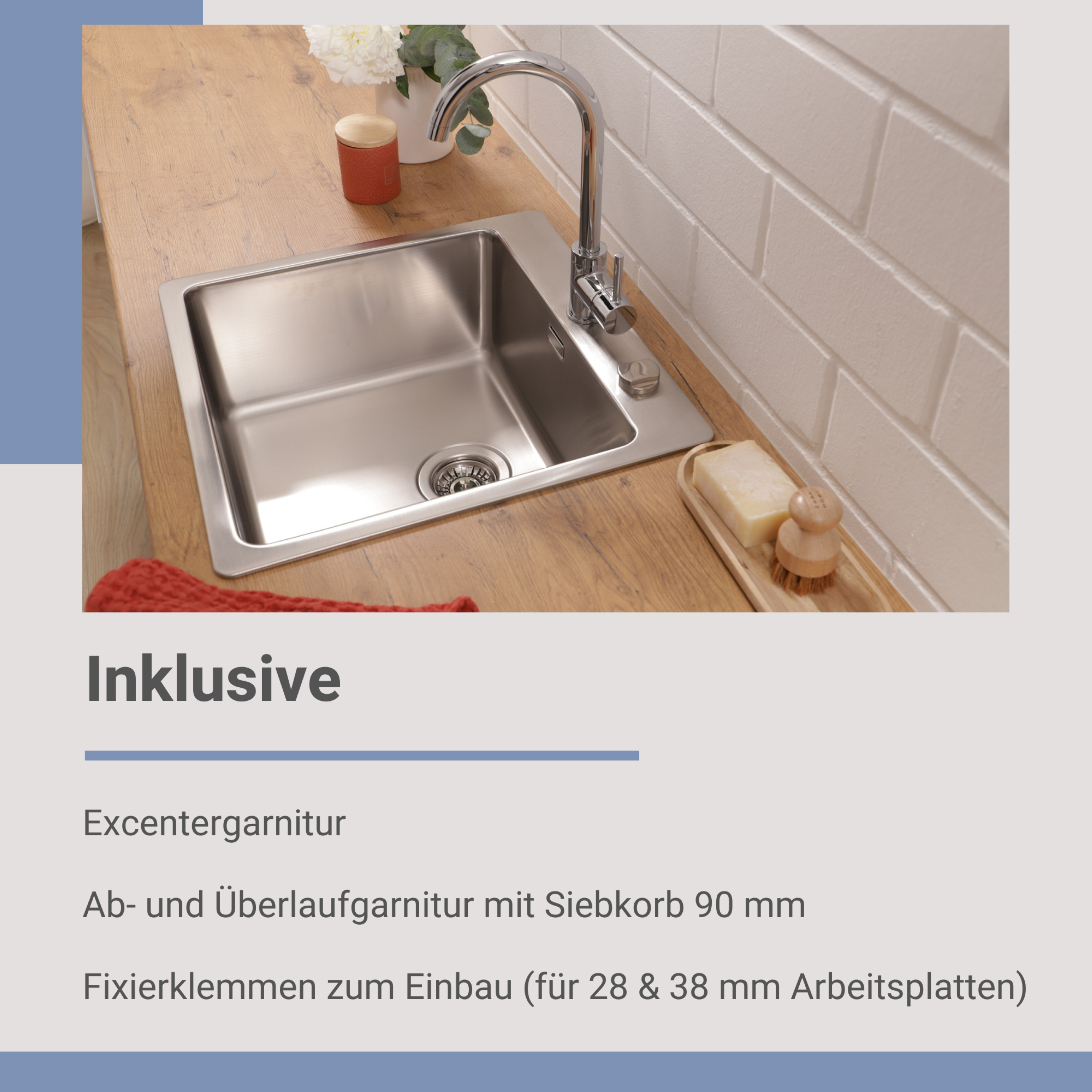 Ein Edelstahlbecken mit Wasserhahn, Seife und Bürste auf einer Holzoberfläche, mit weißer Ziegelmauer.