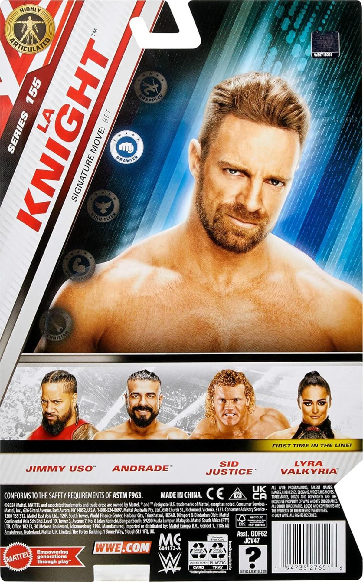 Eine Spielzeugverpackung. Sie zeigt einen Wrestler mit kurzen braunen Haaren und die Namen anderer Wrestler unten.