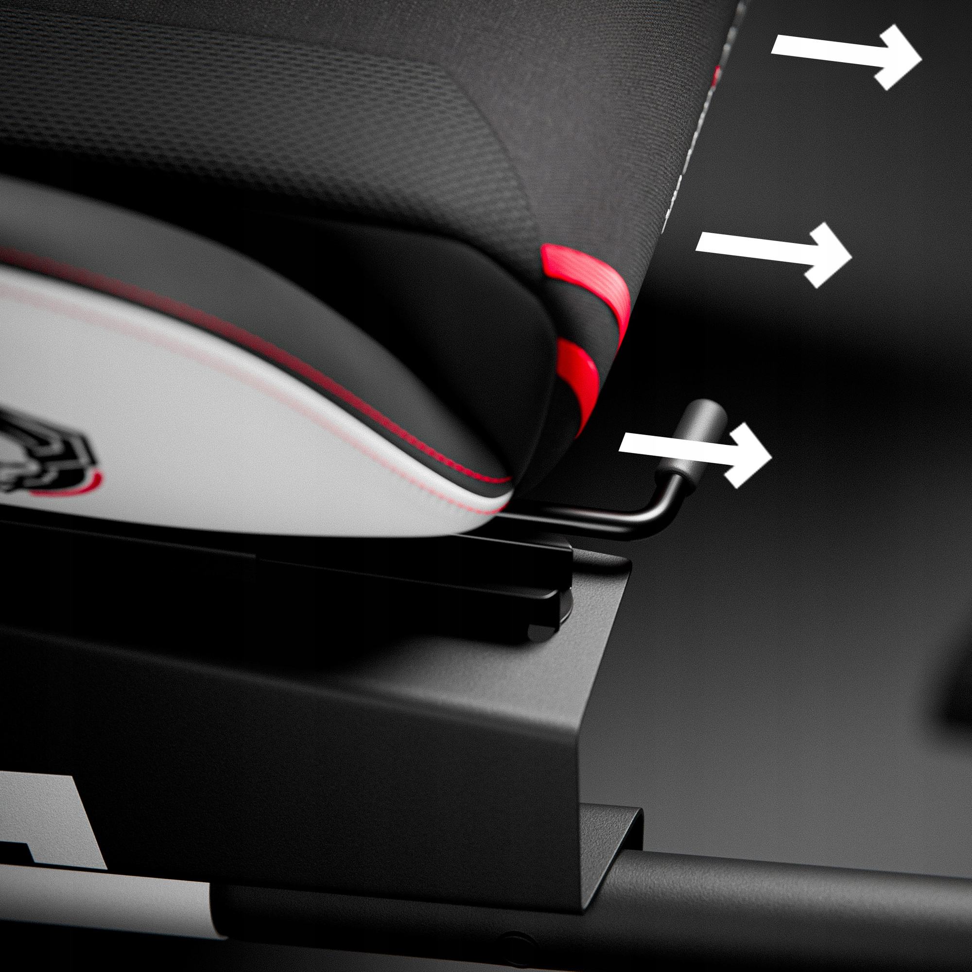 Zbliżenie czarno-białego fotela gamingowego. Strzałki wskazują kierunek. Czerwone detale na siedzisku i czarna podstawa.