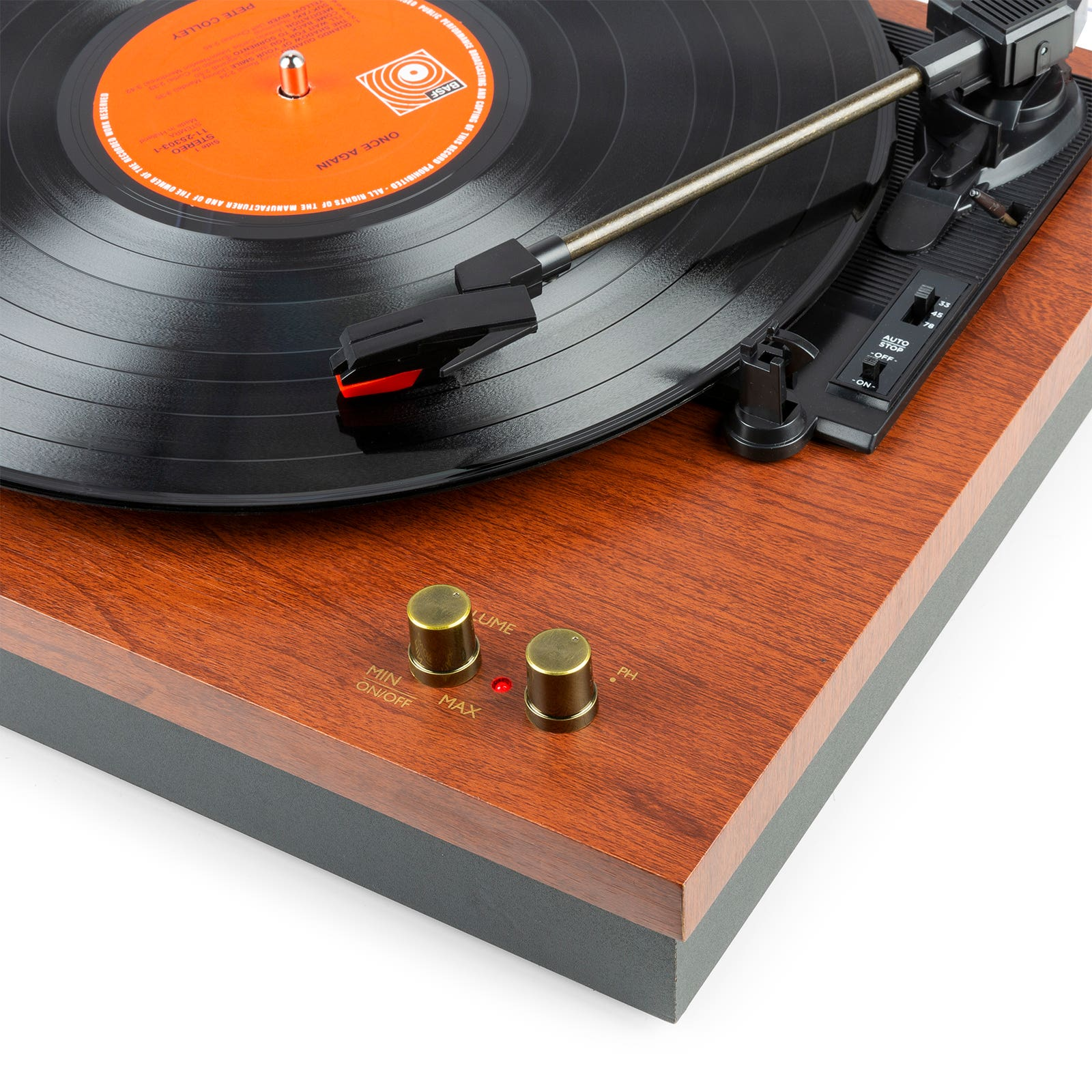A turntable with a record playing. The deck is wood-grained. Controls and a needle are visible.
