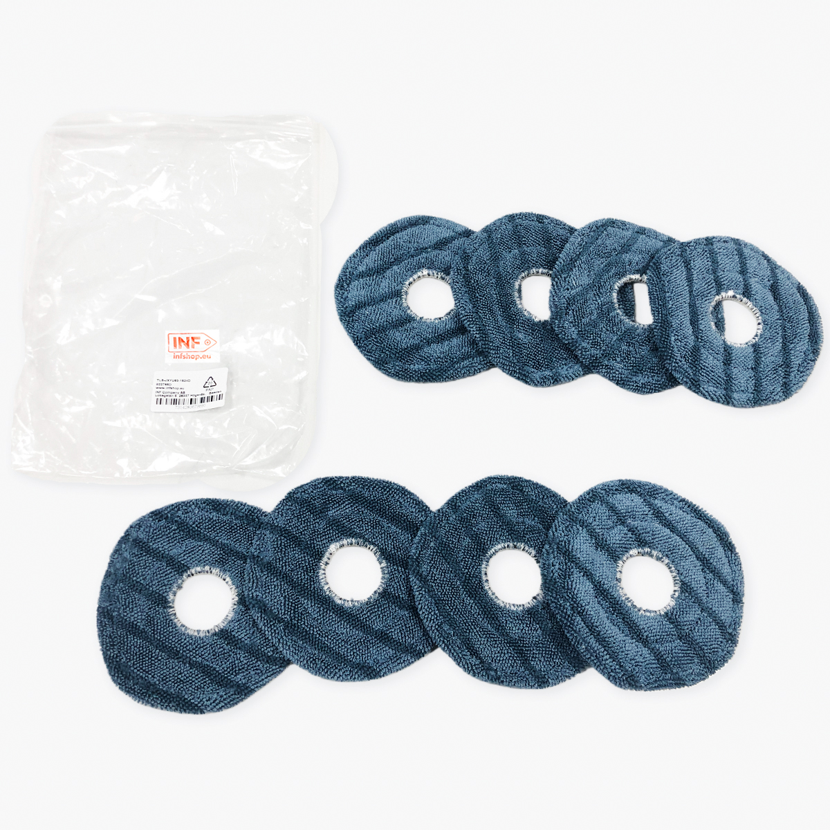 Kilka niebieskich, okrągłych nakładek czyszczących z centralnymi otworami ułożonych na białej powierzchni, wraz z zamkniętą plastikową torbą.