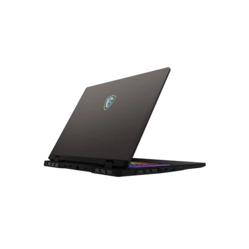 Una laptop gris oscuro está abierta, mostrando un teclado con teclas coloridas. El logotipo de MSI está en la tapa. El fondo es blanco.