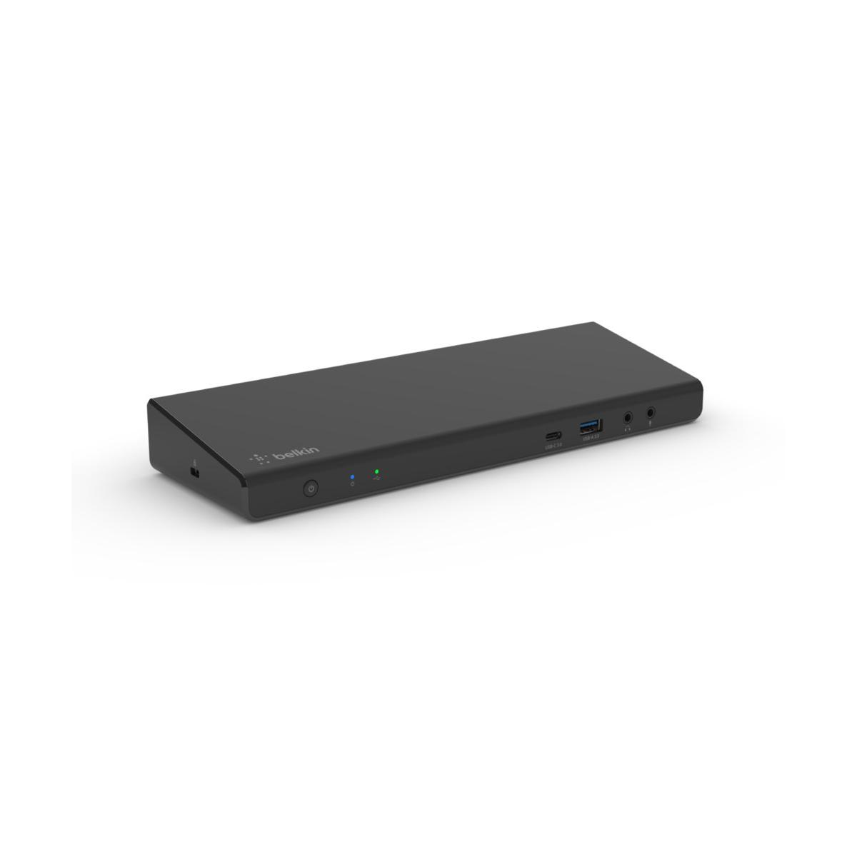 Eine schwarze Belkin-Dockingstation liegt auf einer weißen Oberfläche. Sie hat mehrere Anschlüsse und Kontrollleuchten, das Belkin-Logo ist sichtbar.