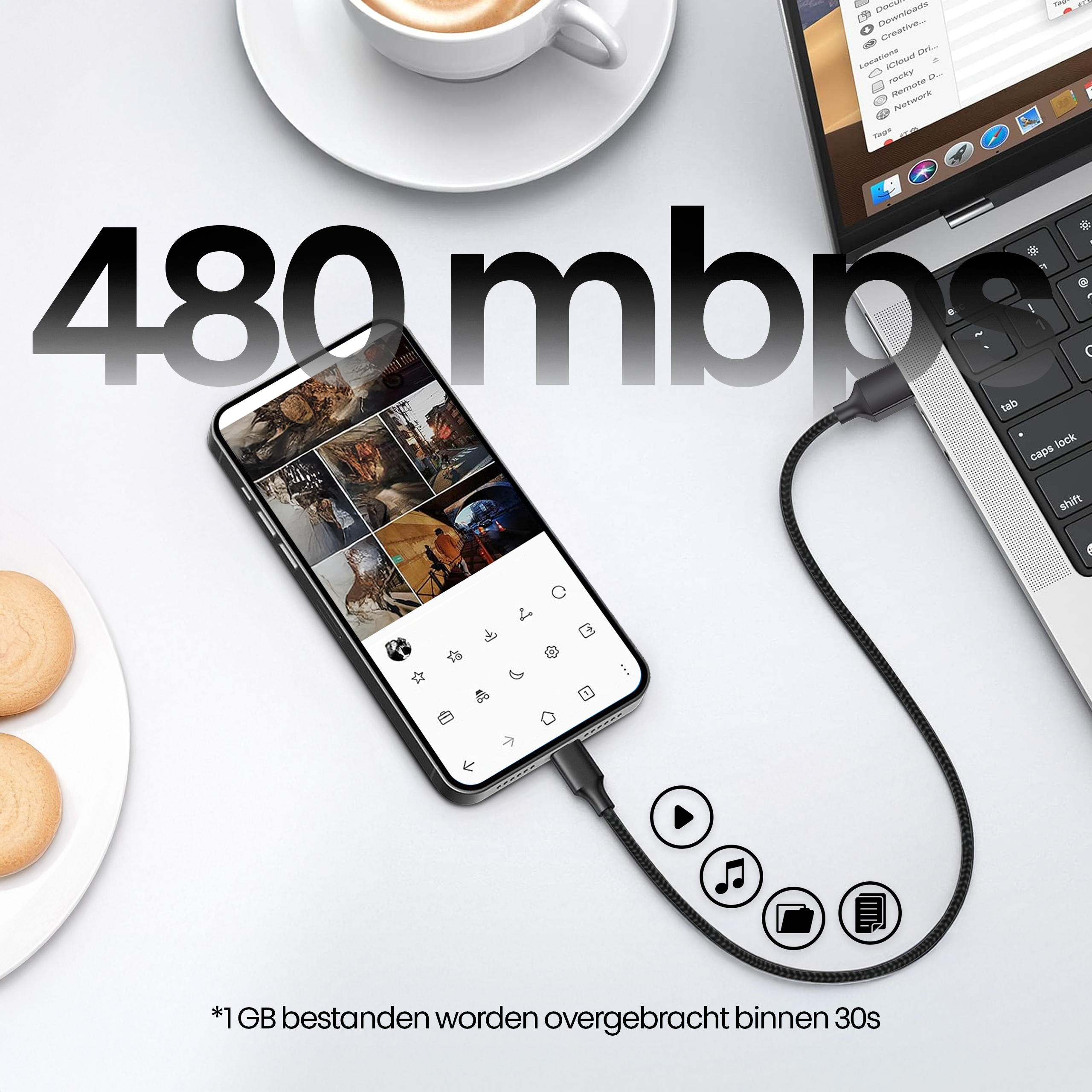 Een telefoon verbonden met een laptop met een kabel. Een kopje koffie en koekjes aan de zijkant. Tekst: 480 mbps.