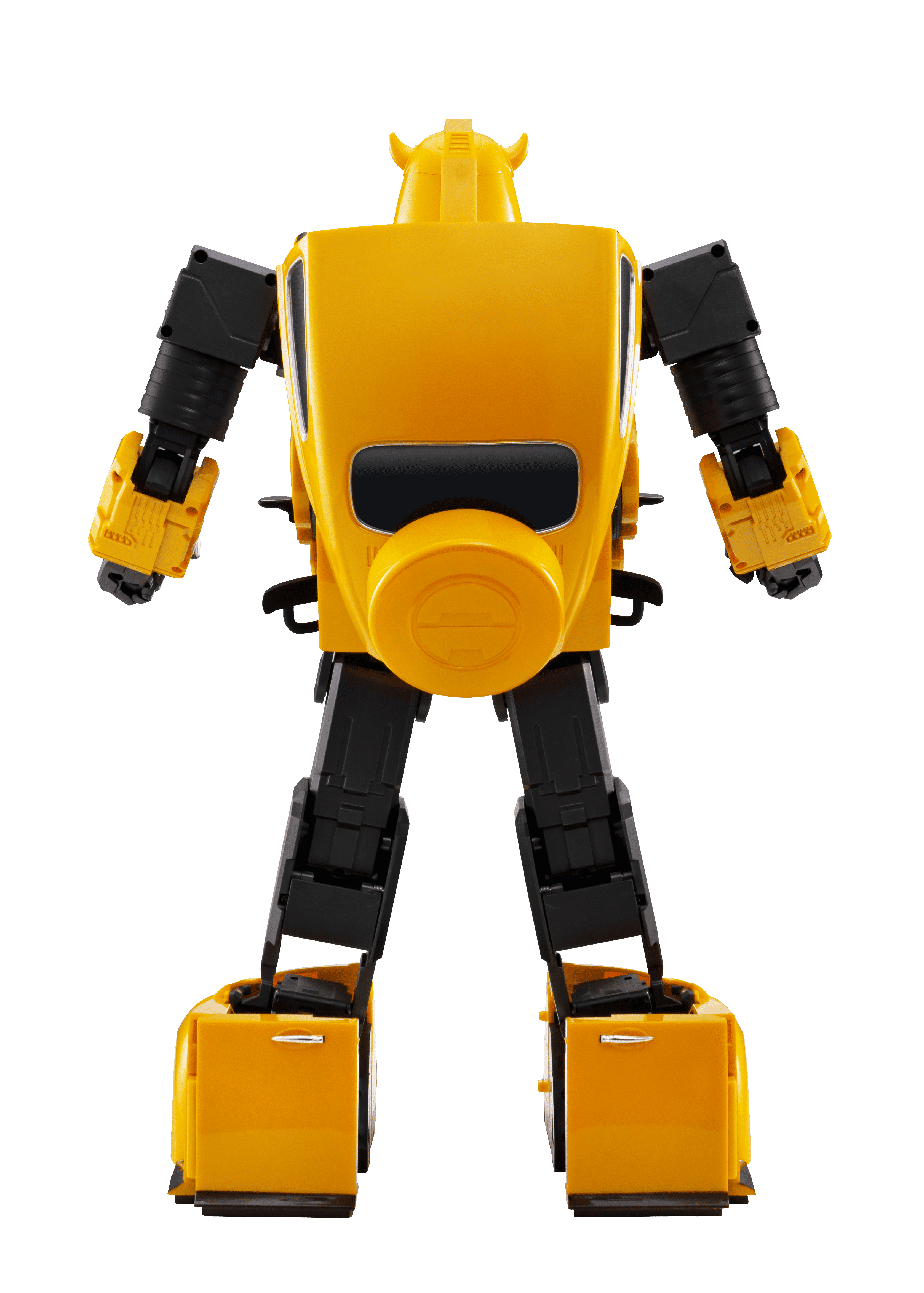 Un juguete robot amarillo y negro se alza sobre un fondo negro. Tiene una sección media redonda y piernas rectangulares.