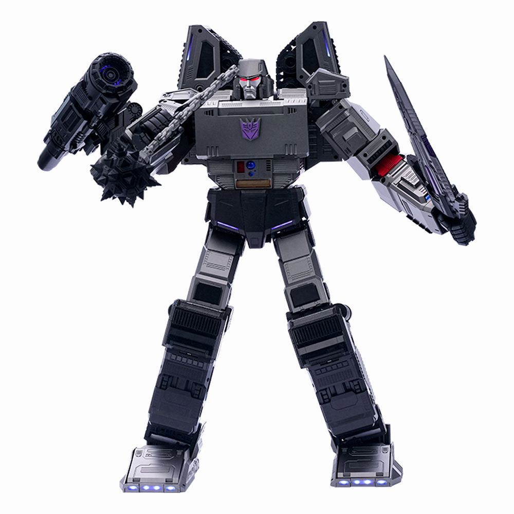 Una figura de acción de Megatron gris y negro está de pie con un cañón y una espada, mirando hacia adelante. El fondo es blanco.