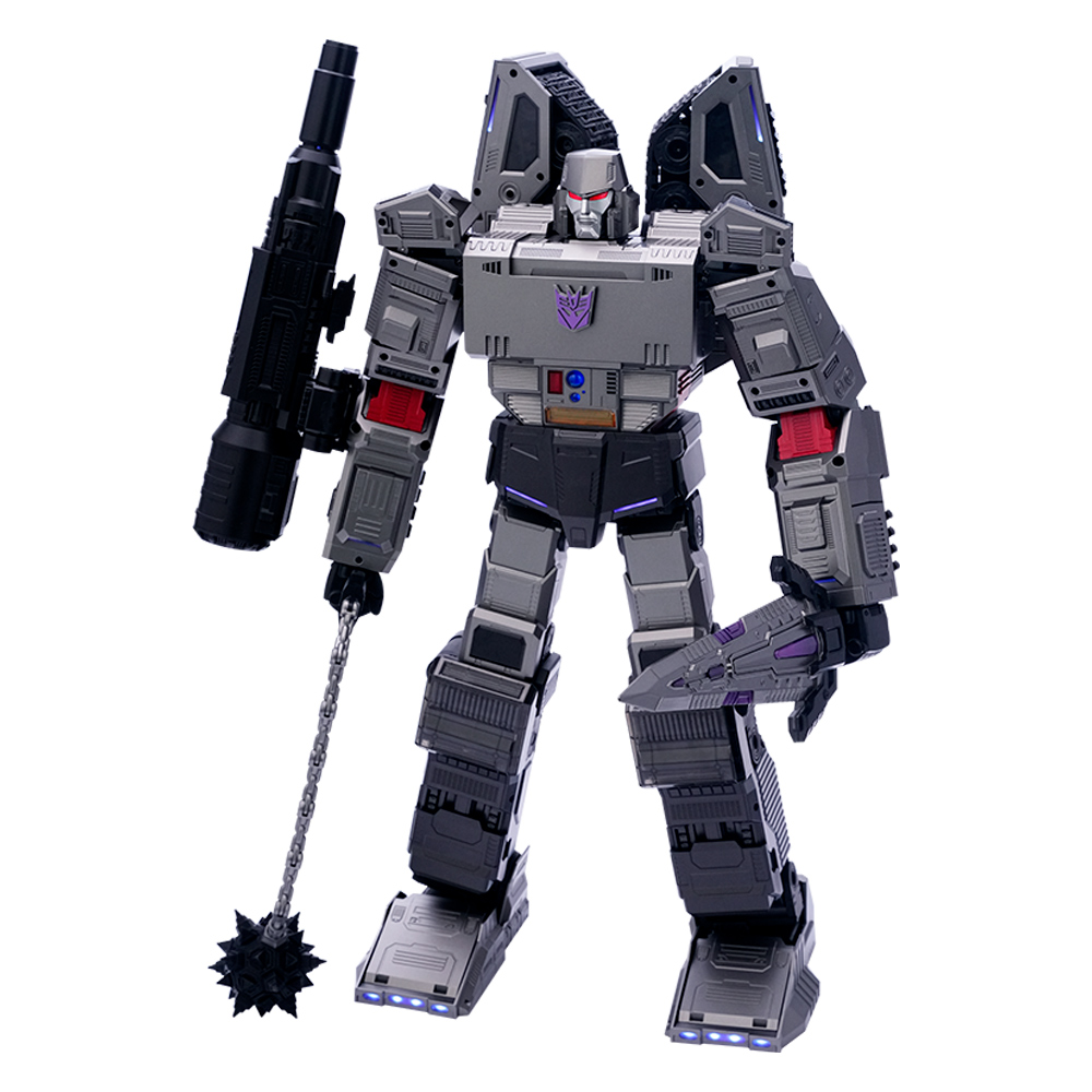 Una figura gris de Megatron sostiene una pistola y un arma con forma de cuchilla. Tiene una insignia morada en el pecho.