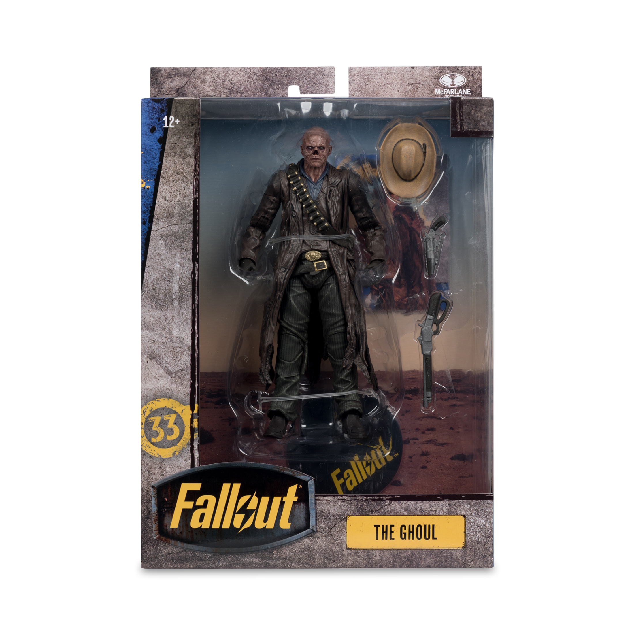 Action figure di The Ghoul in una scatola di Fallout. La figura è marrone e indossa cappotto e cappello. Sono incluse le pistole.
