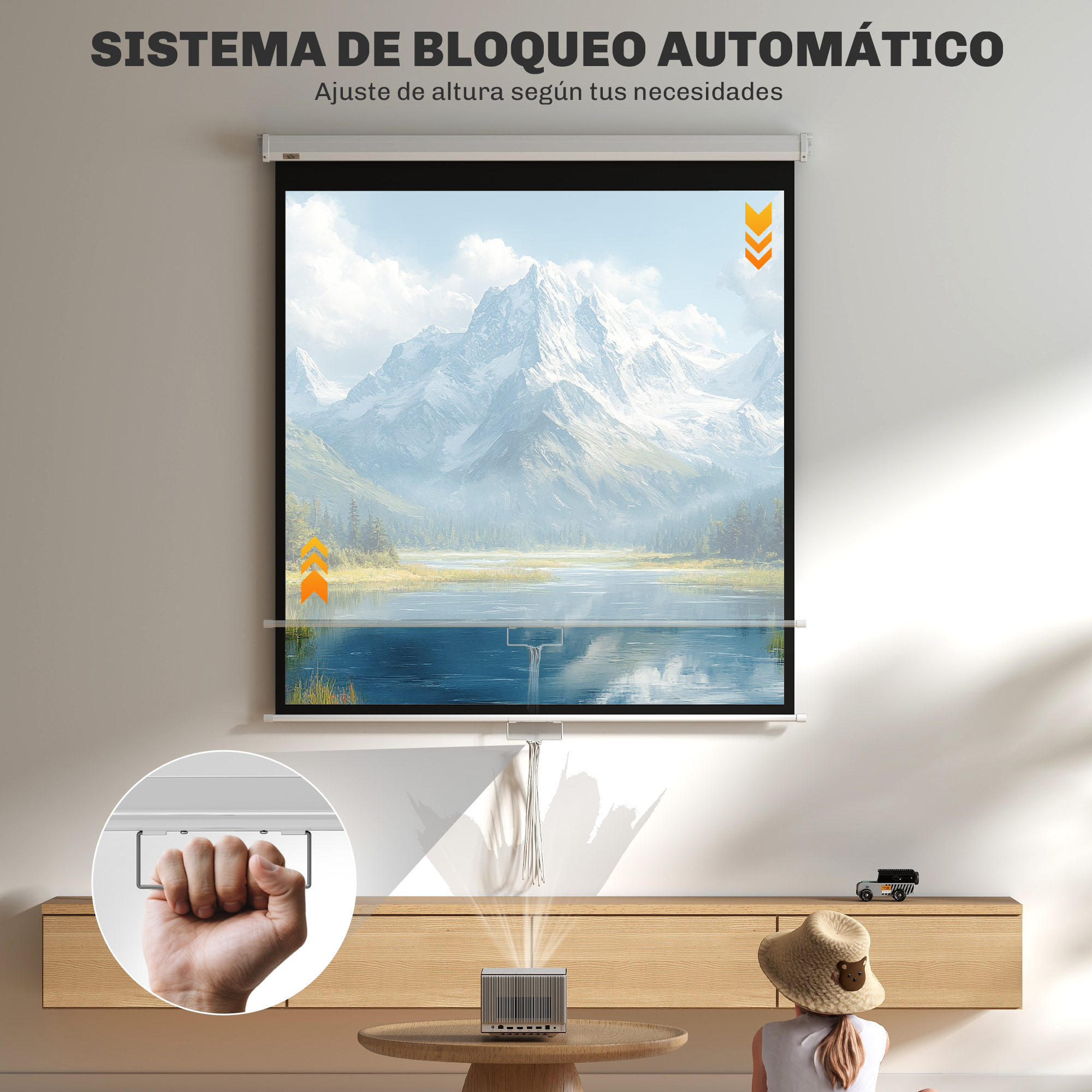 Una pantalla de proyector con un paisaje montañoso. Una mano sujeta parte de la pantalla. Una persona con sombrero la mira.