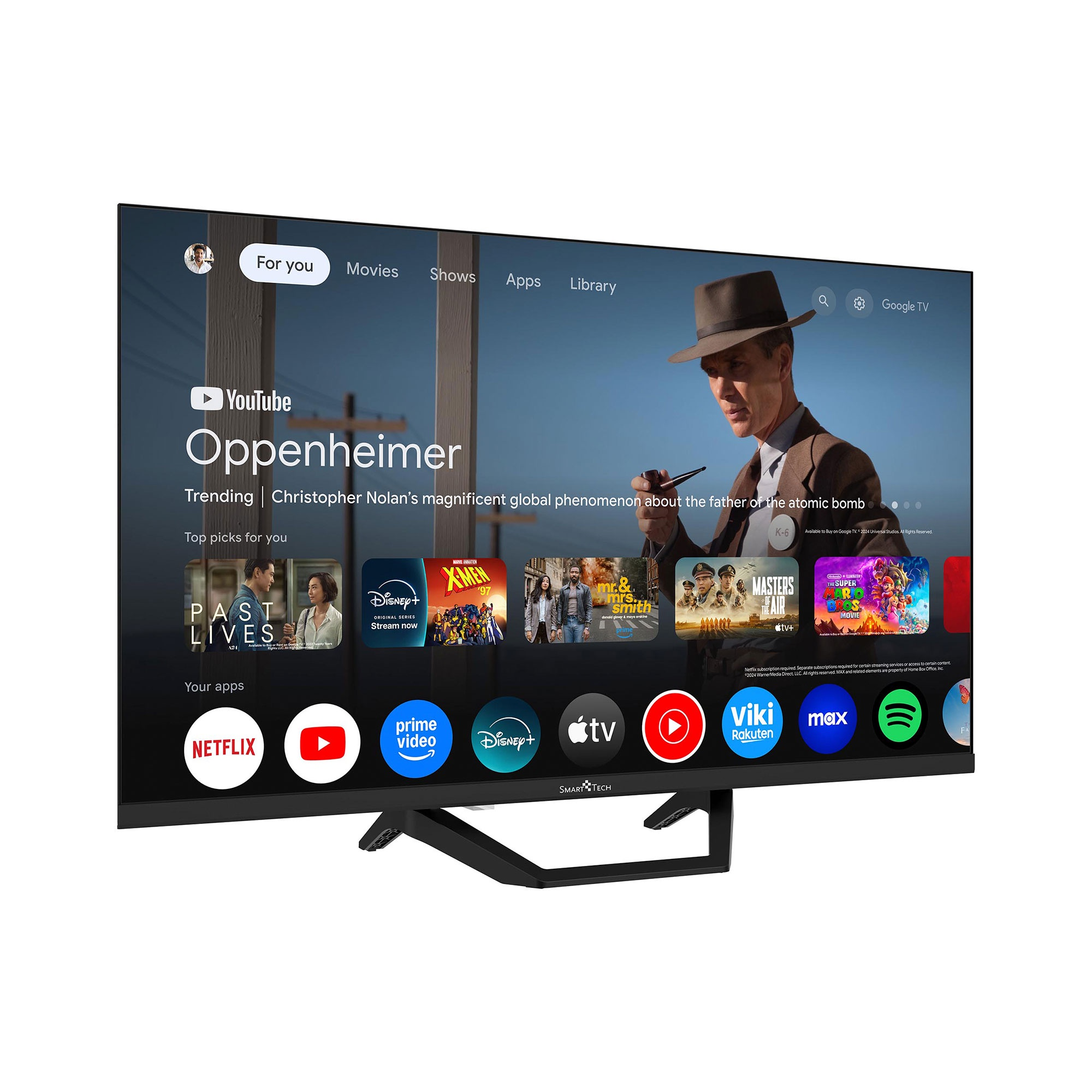 Un televisor Smart Tech muestra una pantalla de inicio de YouTube con Oppenheimer. Aplicaciones como Netflix, Disney+ y Spotify abajo.