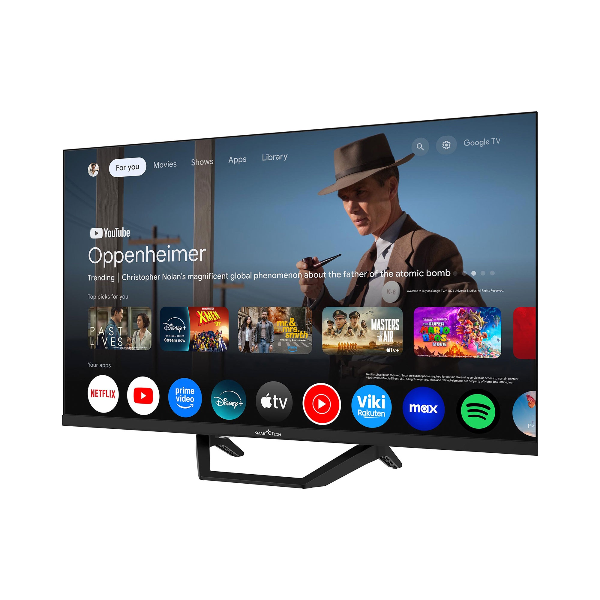 Un televisor Smart Tech muestra una pantalla de película, con aplicaciones en la parte inferior. El televisor muestra a un hombre con sombrero.