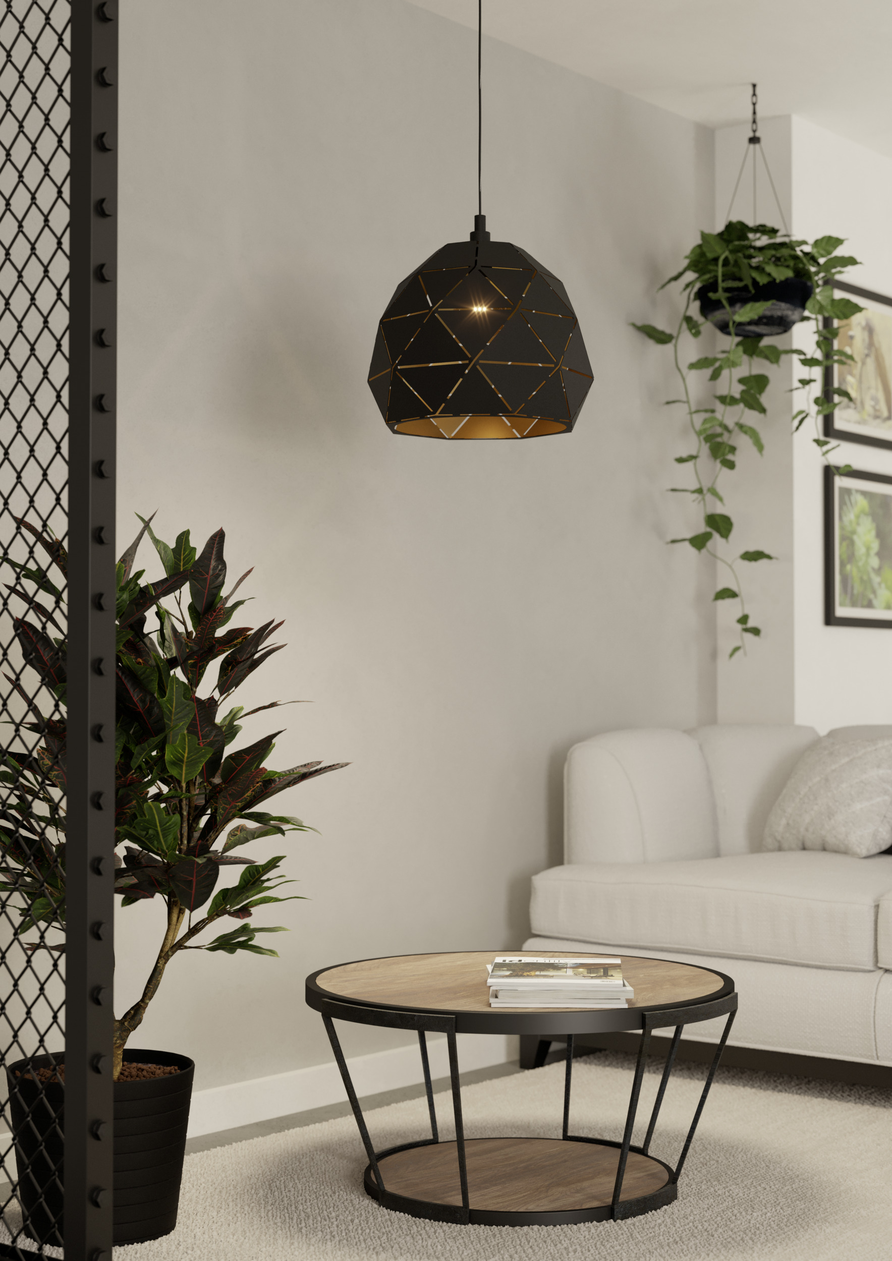 Wohnzimmerszene mit schwarzer geometrischer Lampe, Pflanzen, rundem Tisch und weißem Sofa.