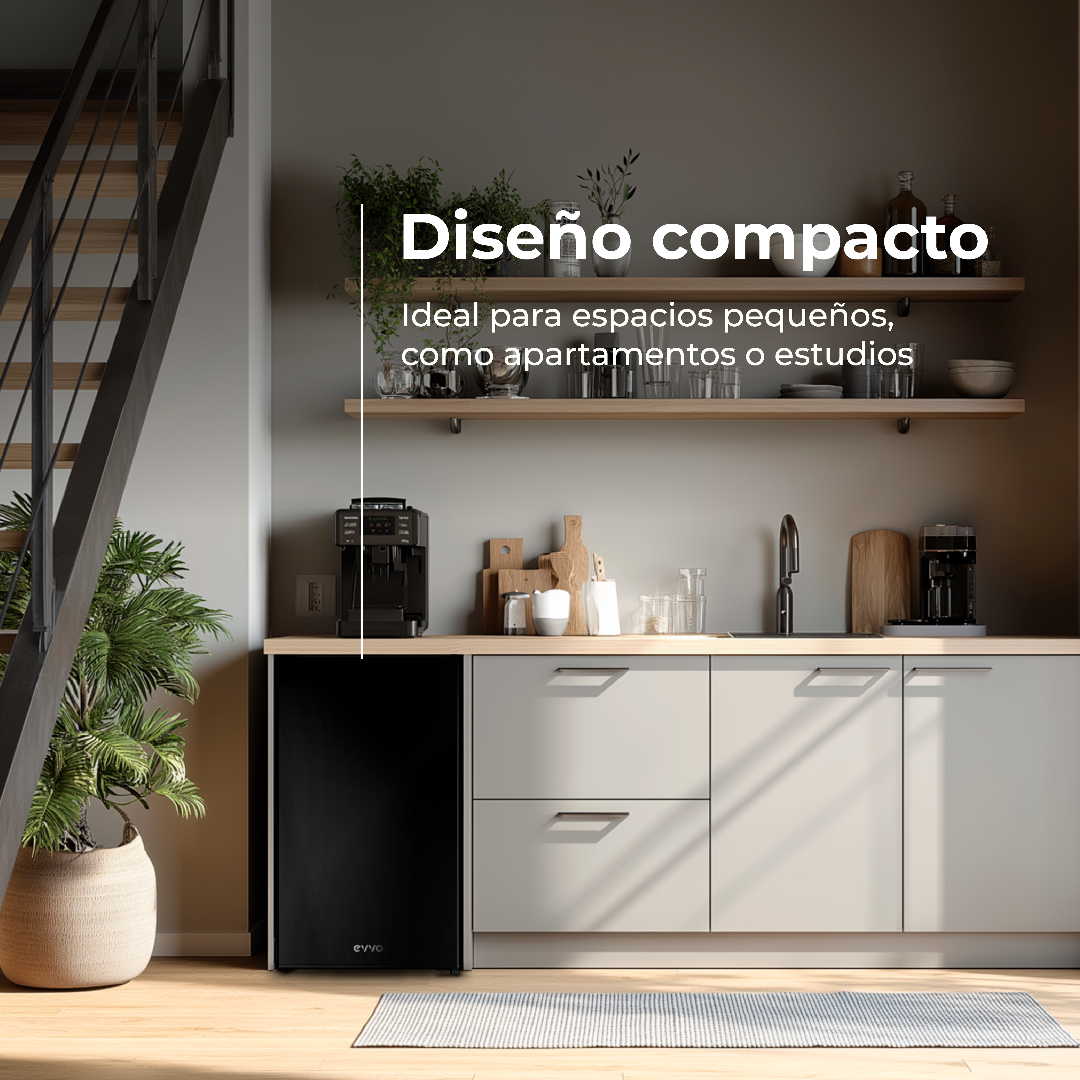 Escena de cocina con nevera negra, gabinetes claros, encimeras de madera, plantas y una escalera en el fondo.