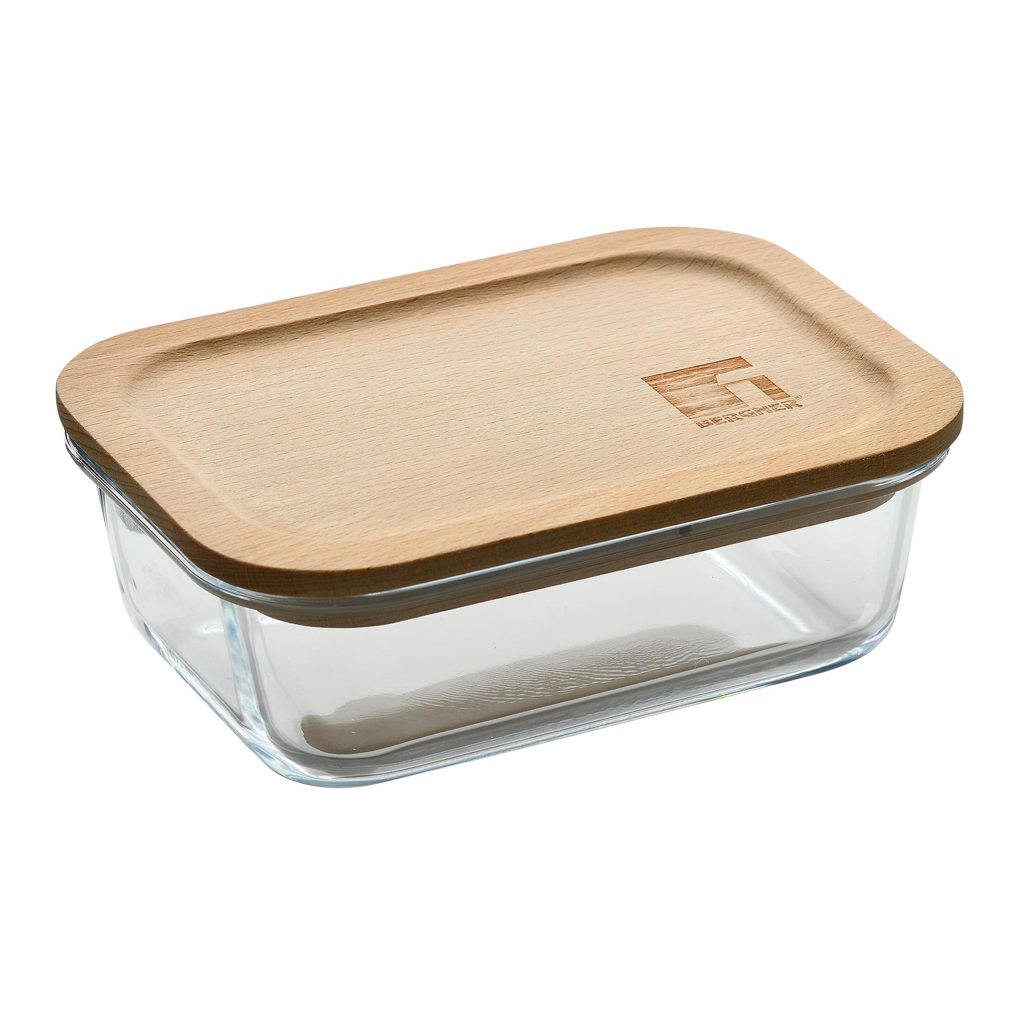 Un recipiente rectangular de vidrio con tapa de madera. La tapa tiene un logotipo y el nombre de la marca.