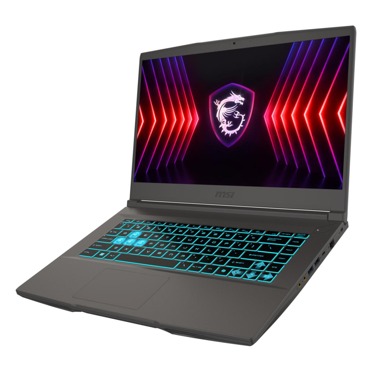 Ein grauer MSI-Laptop ist geöffnet und zeigt ein Logo auf dem Bildschirm. Die Tastatur ist blau hinterleuchtet, der Bildschirm zeigt ein Drachenlogo.