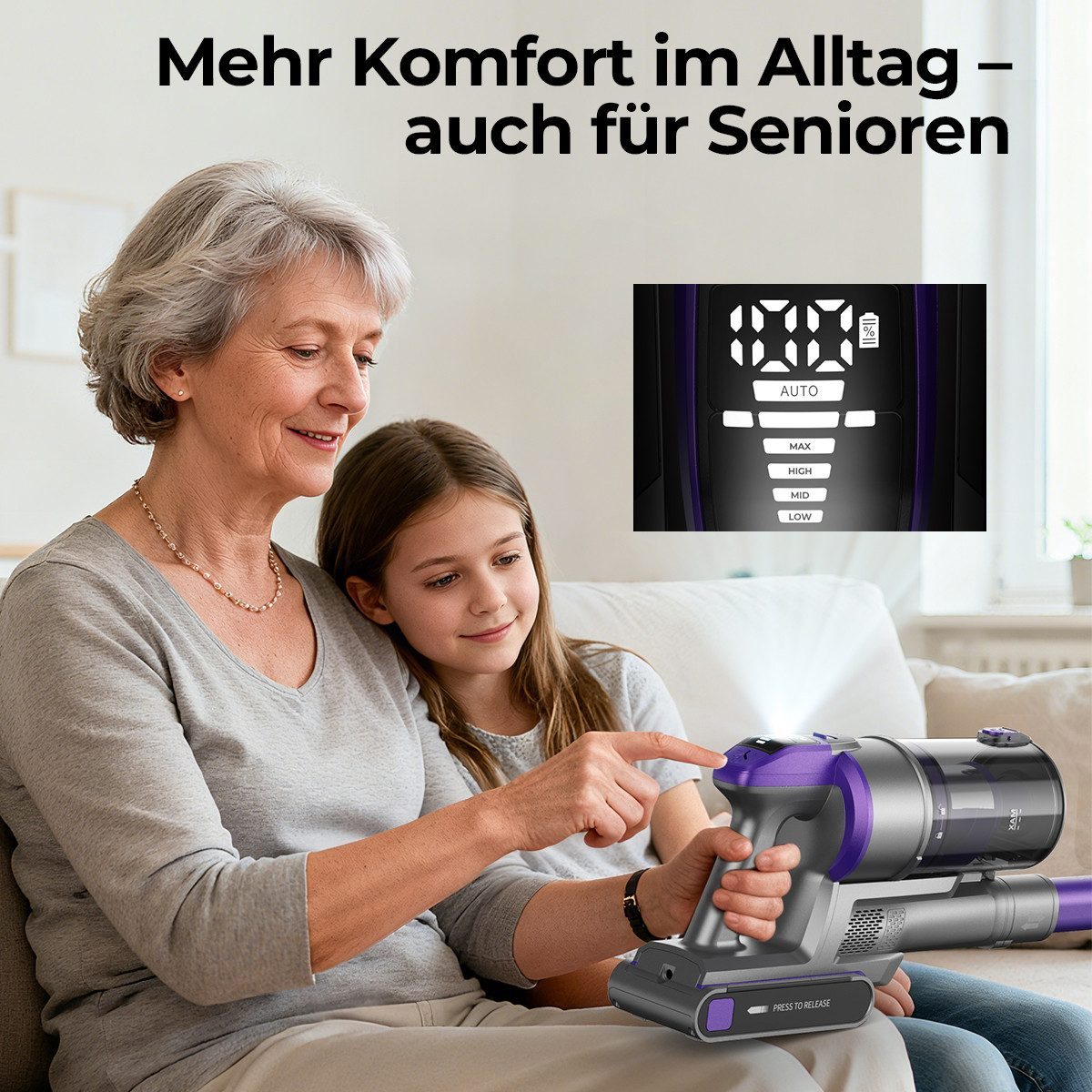 Une femme âgée et une fille regardent un aspirateur. L'aspirateur est argenté et violet. La femme le montre du doigt.