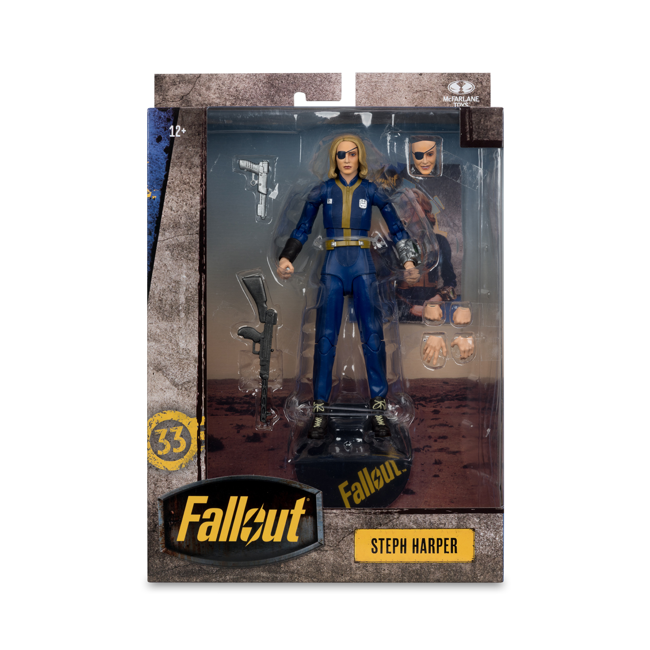 Una action figure di Fallout Steph Harper in una scatola. Include una figura, una testa alternativa, mani extra e una pistola.