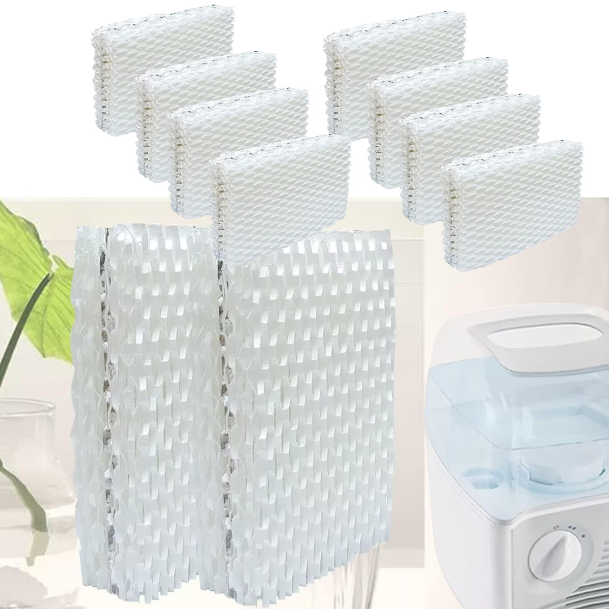 Mehrere weiße Luftbefeuchterfilter mit einem weißen Luftbefeuchter und einem grünen Blatt im Hintergrund.