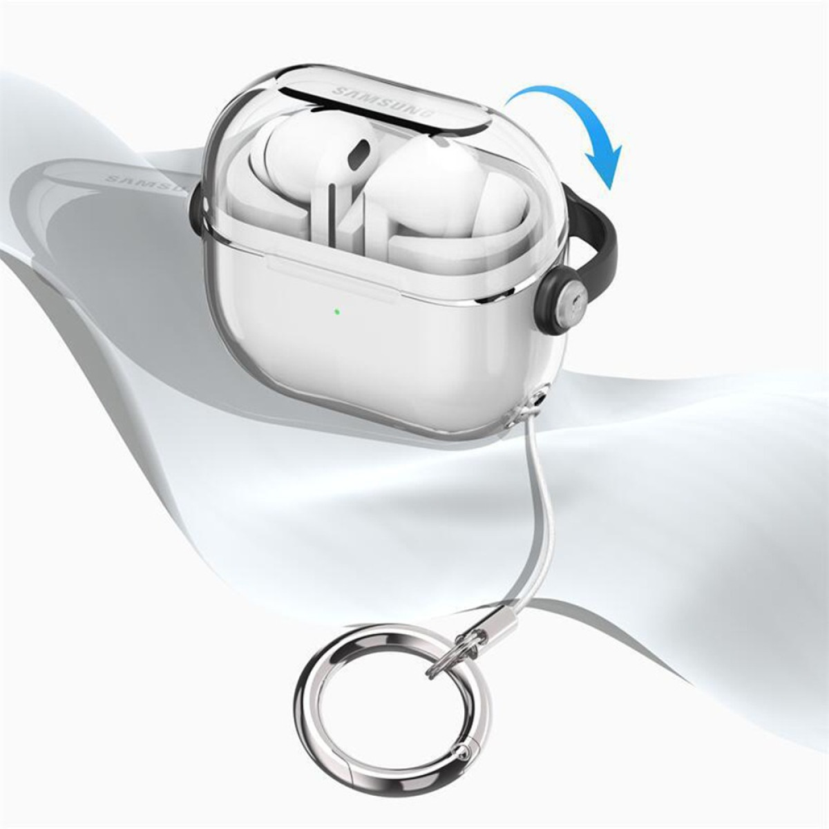 White earbuds in a clear case with a silver keyring attached. The case is labeled Samsung. A blue arrow shows the opening.