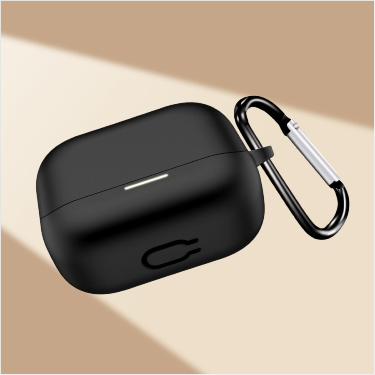 A black AirPods case with a silver carabiner clip. The case has a small white light and a charging port. Background is beige.
