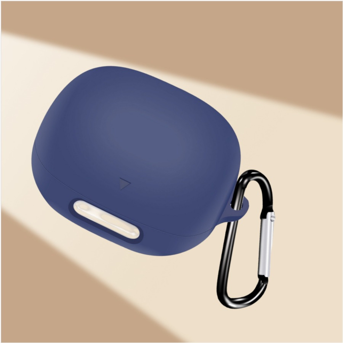 A navy blue earbud case with a black carabiner clip. The background is a soft beige color. The case is angled towards the viewer.