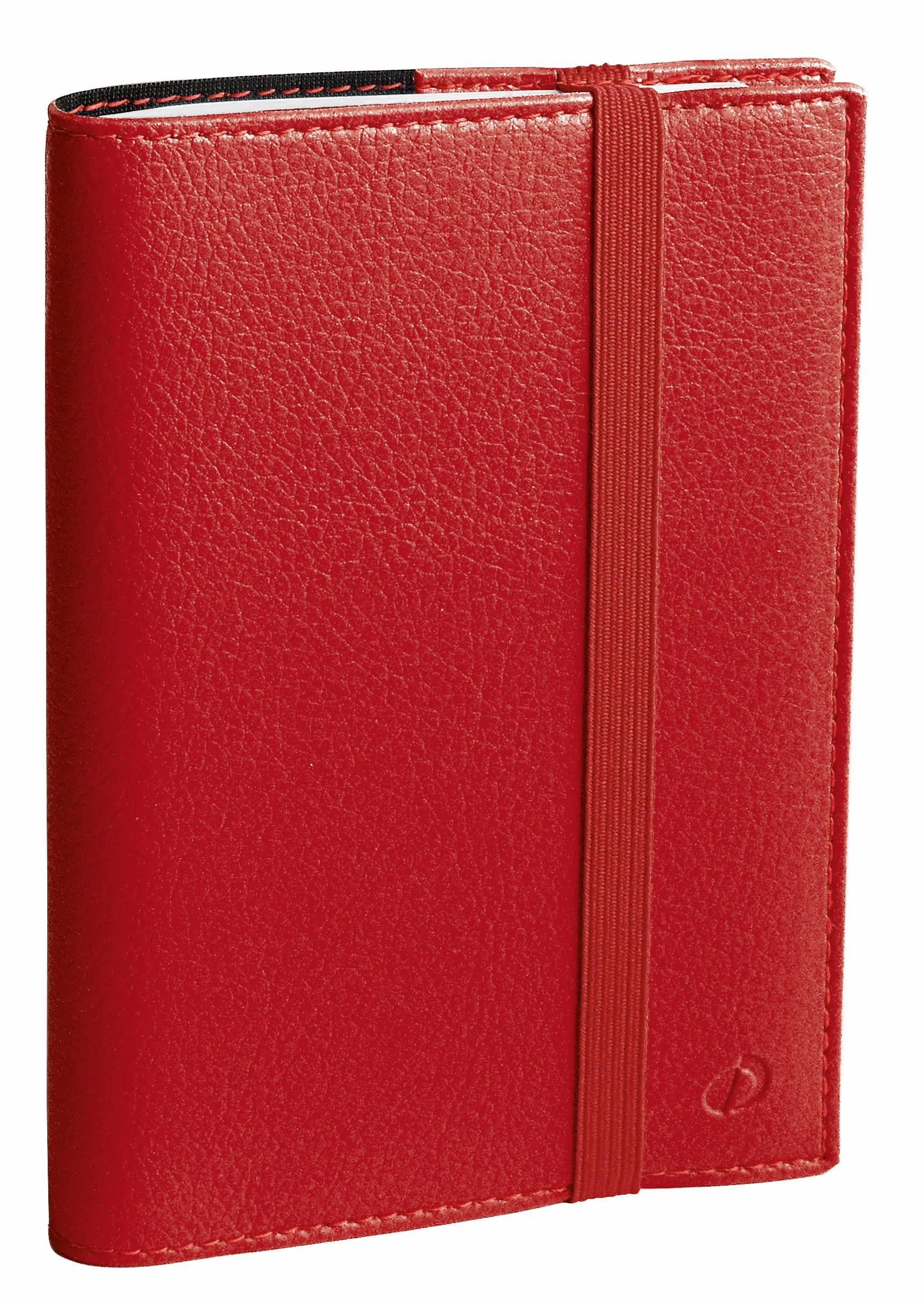 Cuaderno de cuero rojo con cierre de banda elástica. La cubierta tiene una superficie texturizada y un logotipo en relieve.