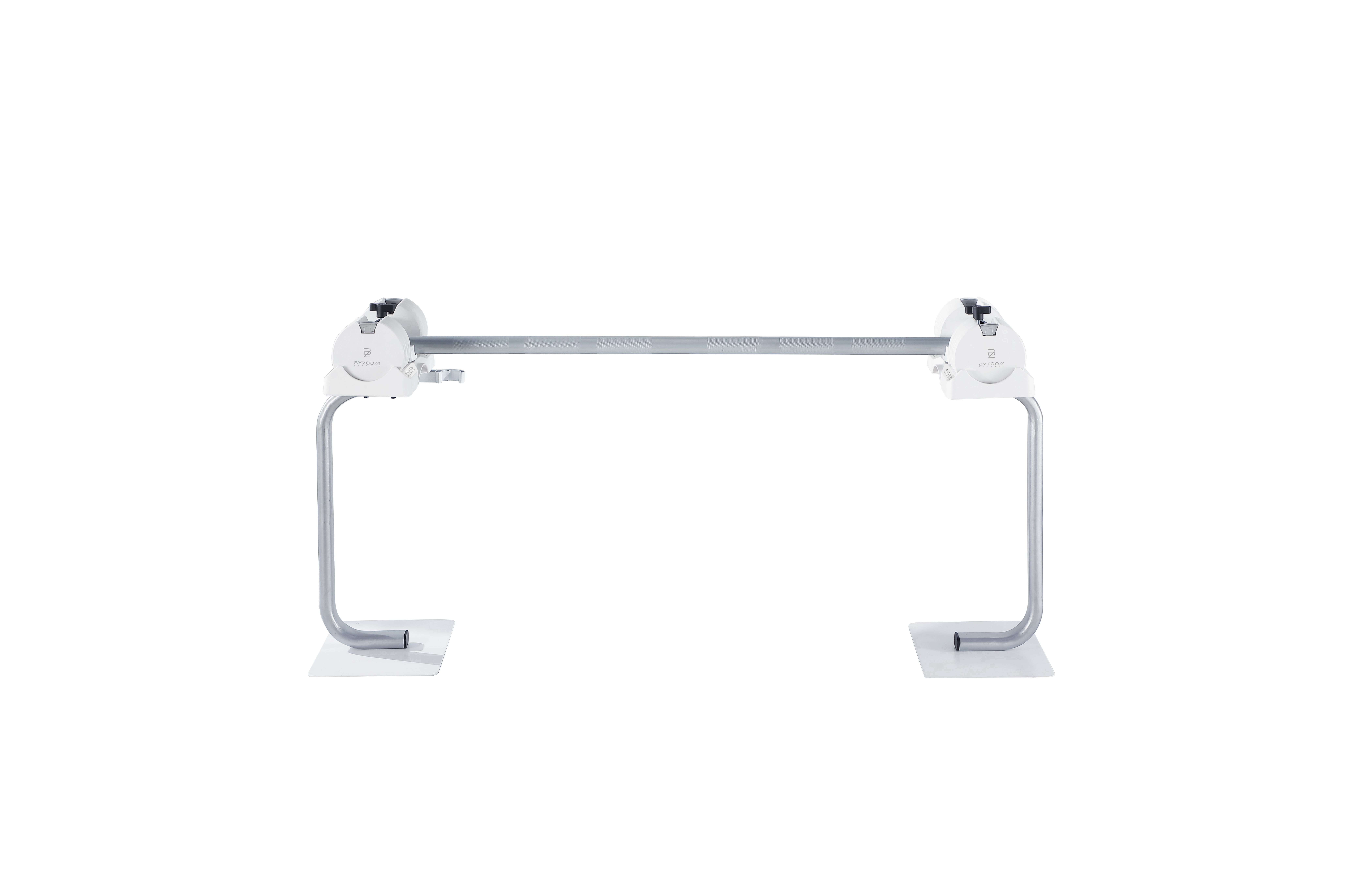 Un appareil blanc et argenté avec une barre horizontale soutenue par deux supports verticaux.
