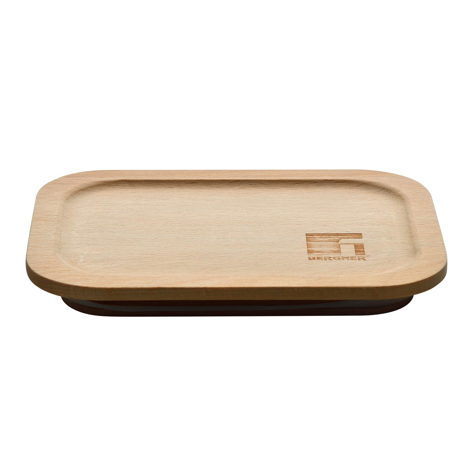 Una tapa rectangular de madera con esquinas redondeadas, un ligero hueco y un logotipo de marca. El fondo es blanco.