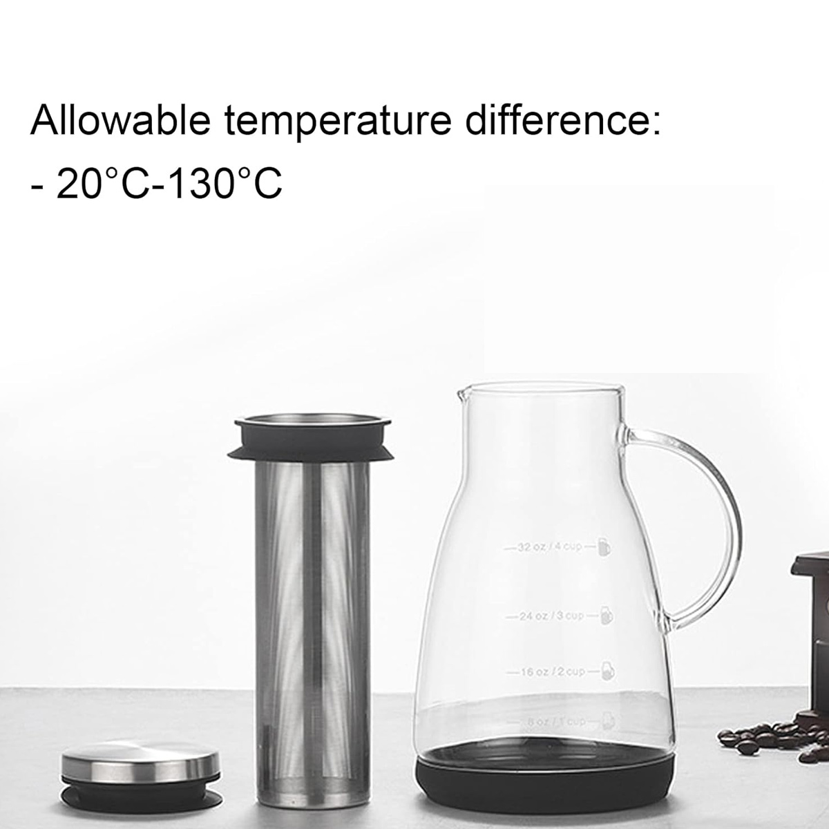 Ein Kaffeebereiter-Set mit Glaskaraffe, Edelstahlfilter und schwarzem Sockel. Temperaturbereich -20°C bis 130°C.