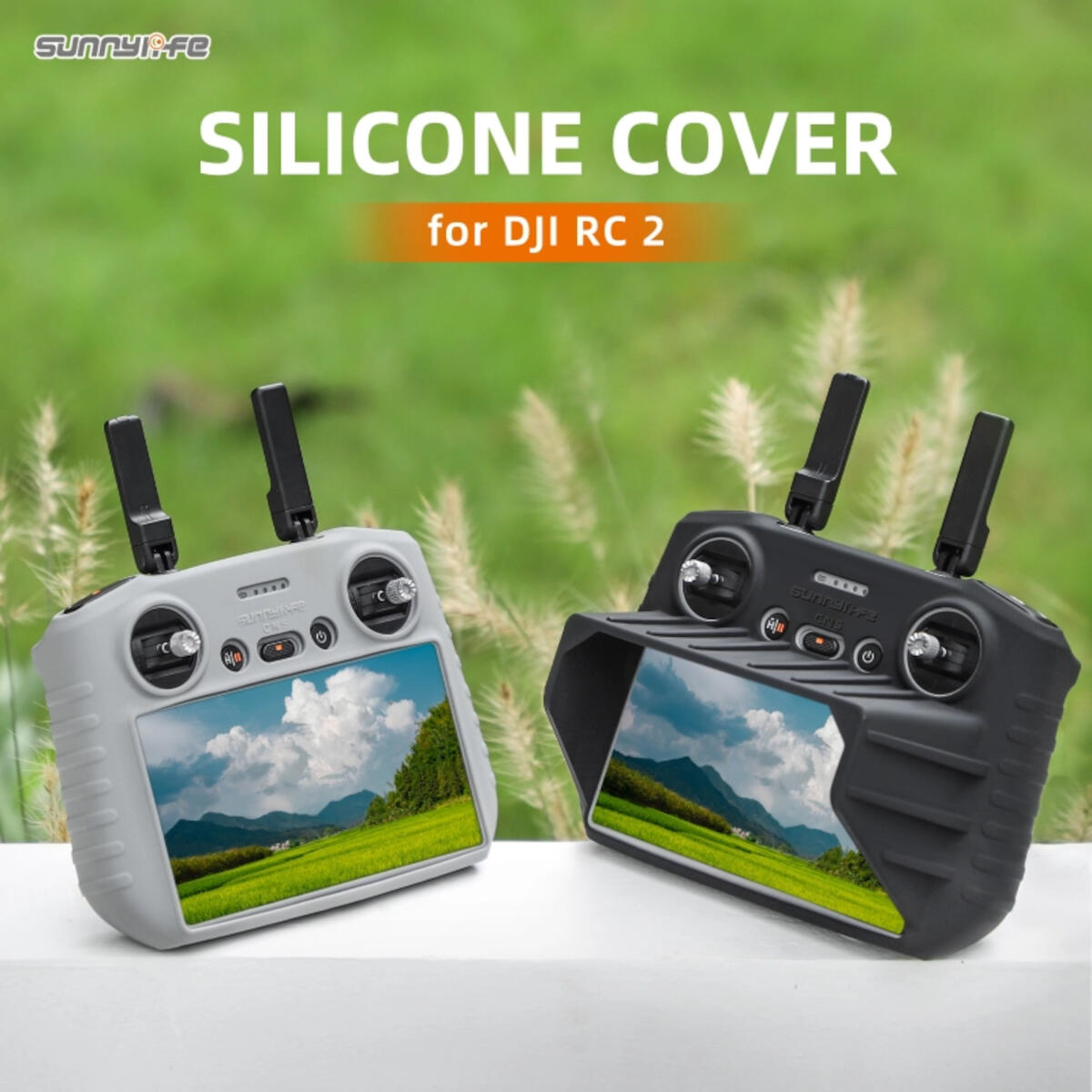 Two drone controllers with screen covers. One is gray, the other black. Background shows green foliage and text 'SILICONE COVER'.