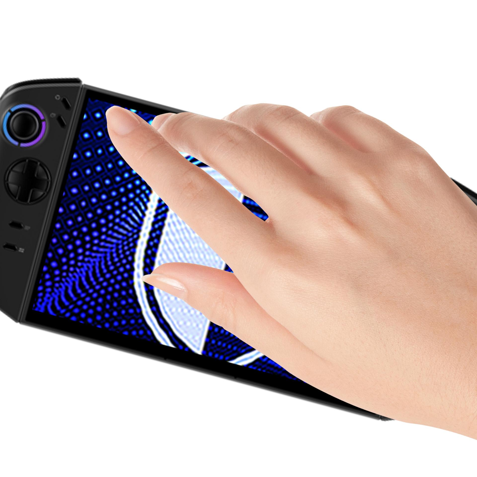 Una mano toca un dispositivo de juego portátil negro. La pantalla muestra un diseño azul. El fondo es blanco.