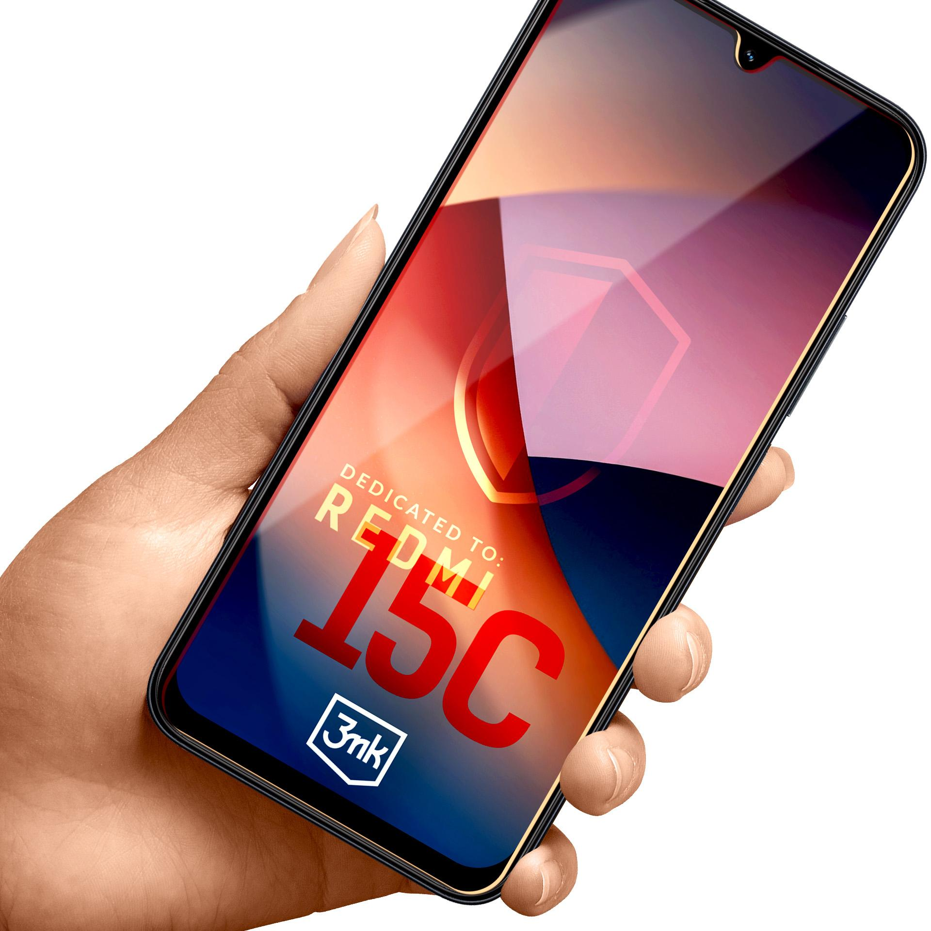 Mano che tiene un telefono con schermo che mostra 'Redmi 15C' e un logo, su sfondo sfumato.