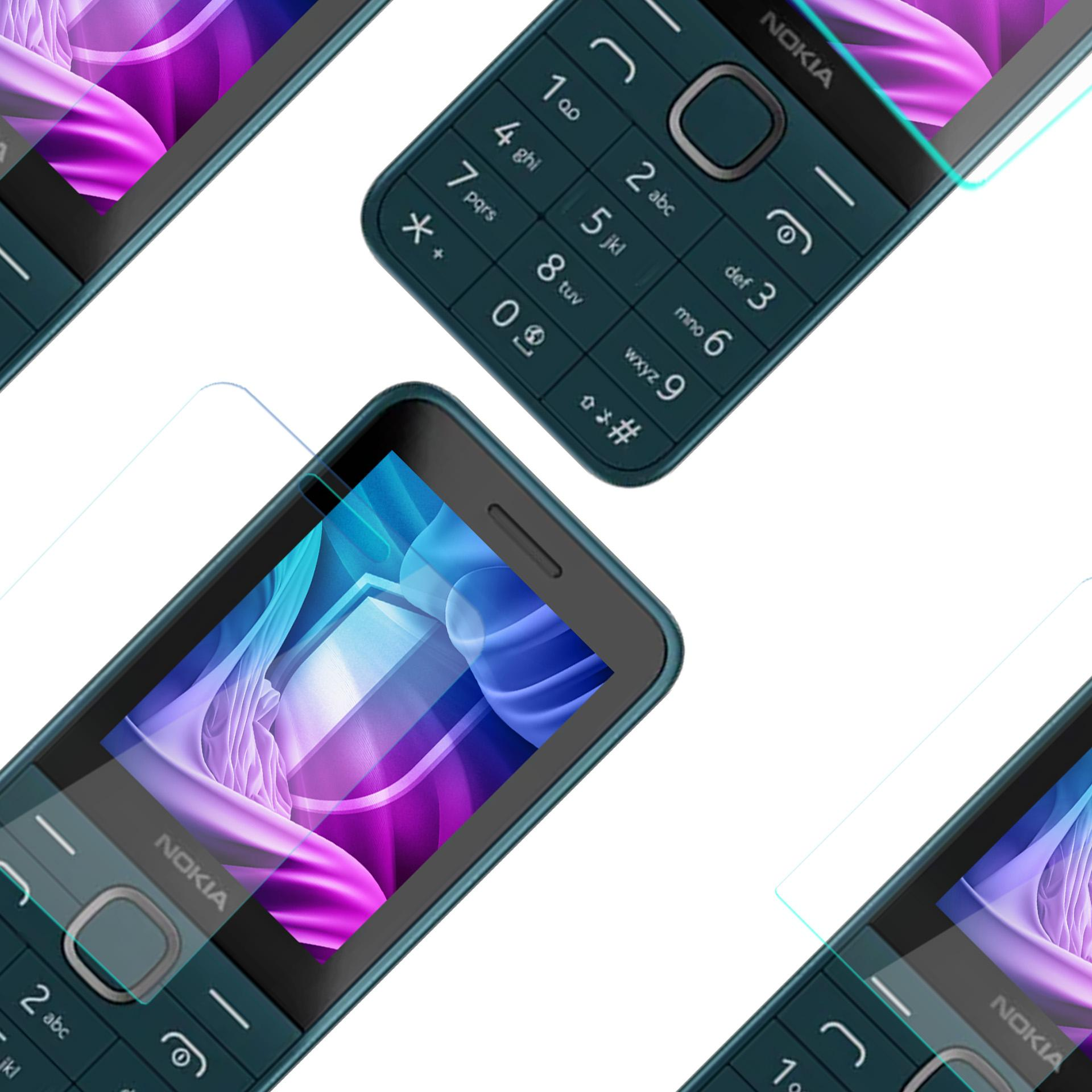 Kilka telefonów Nokia z osłonami ekranu. Każdy telefon wyświetla kolorowy abstrakcyjny obraz na ekranie.