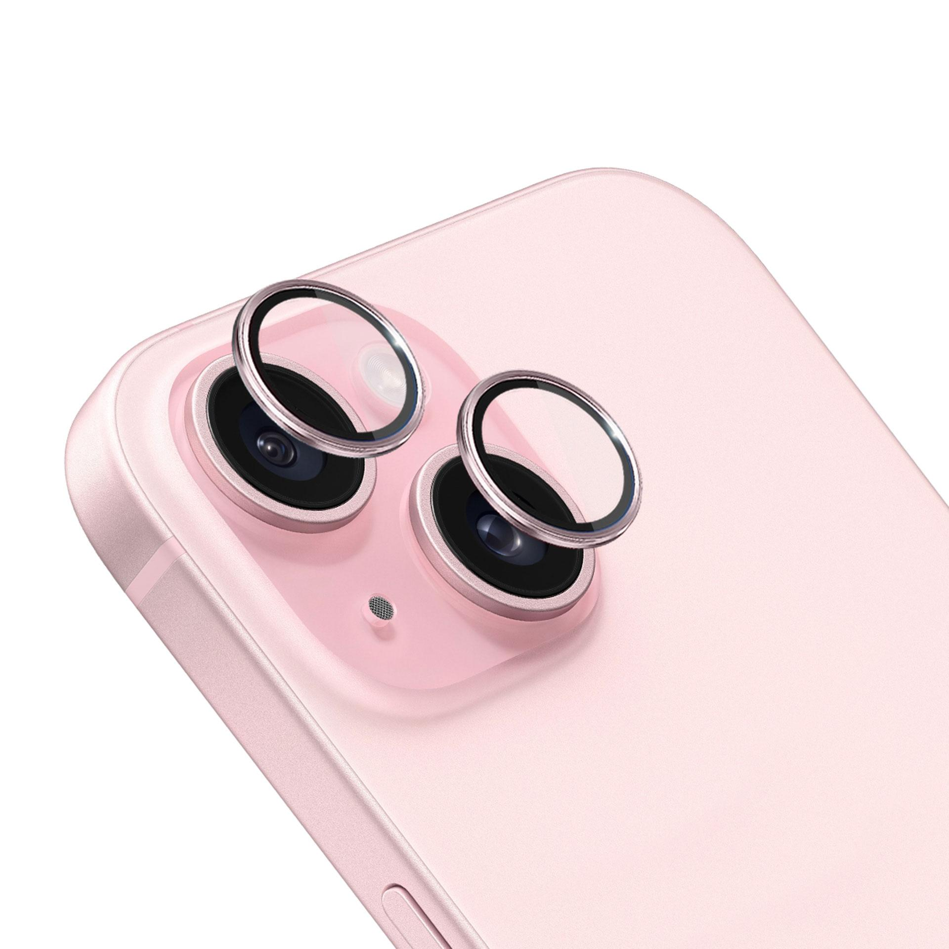 Retro del telefono rosa con lenti della fotocamera. Due lenti visibili, ciascuna circondata da un anello d'argento.